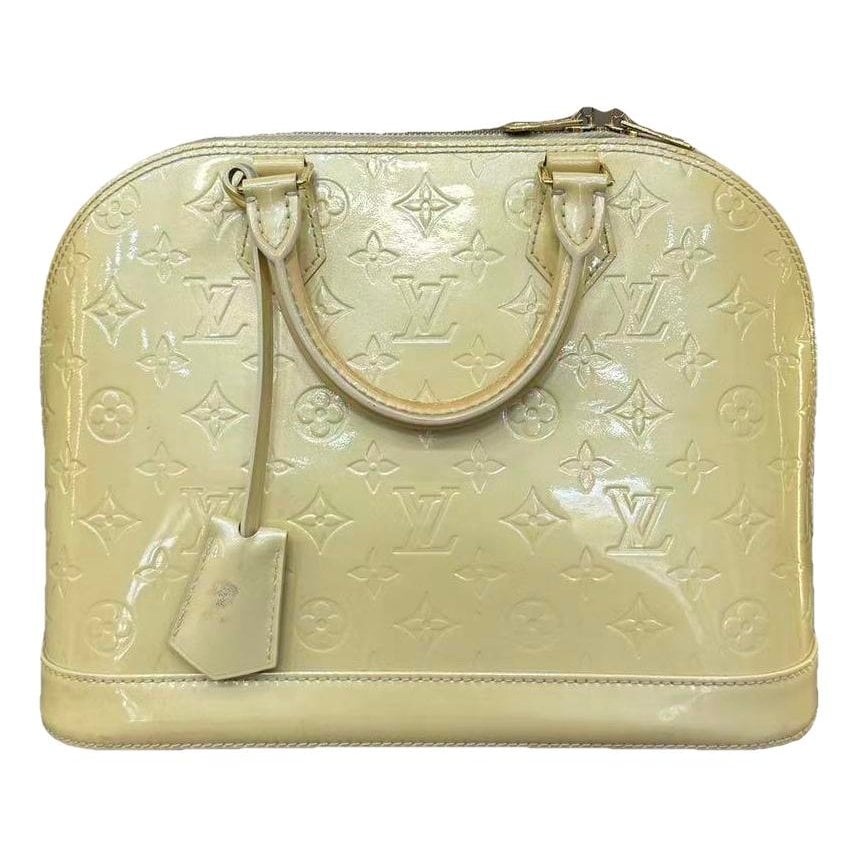 Alma patent leather handbag