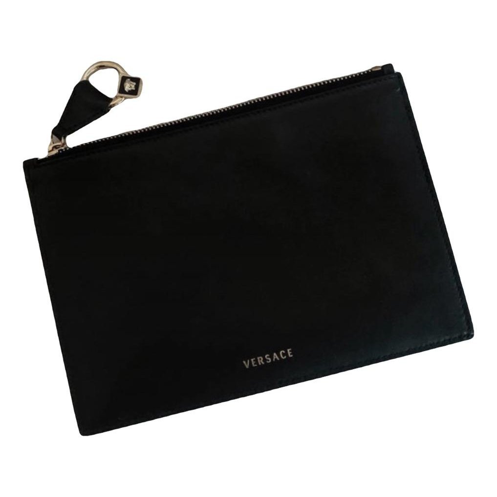La Medusa leather clutch bag