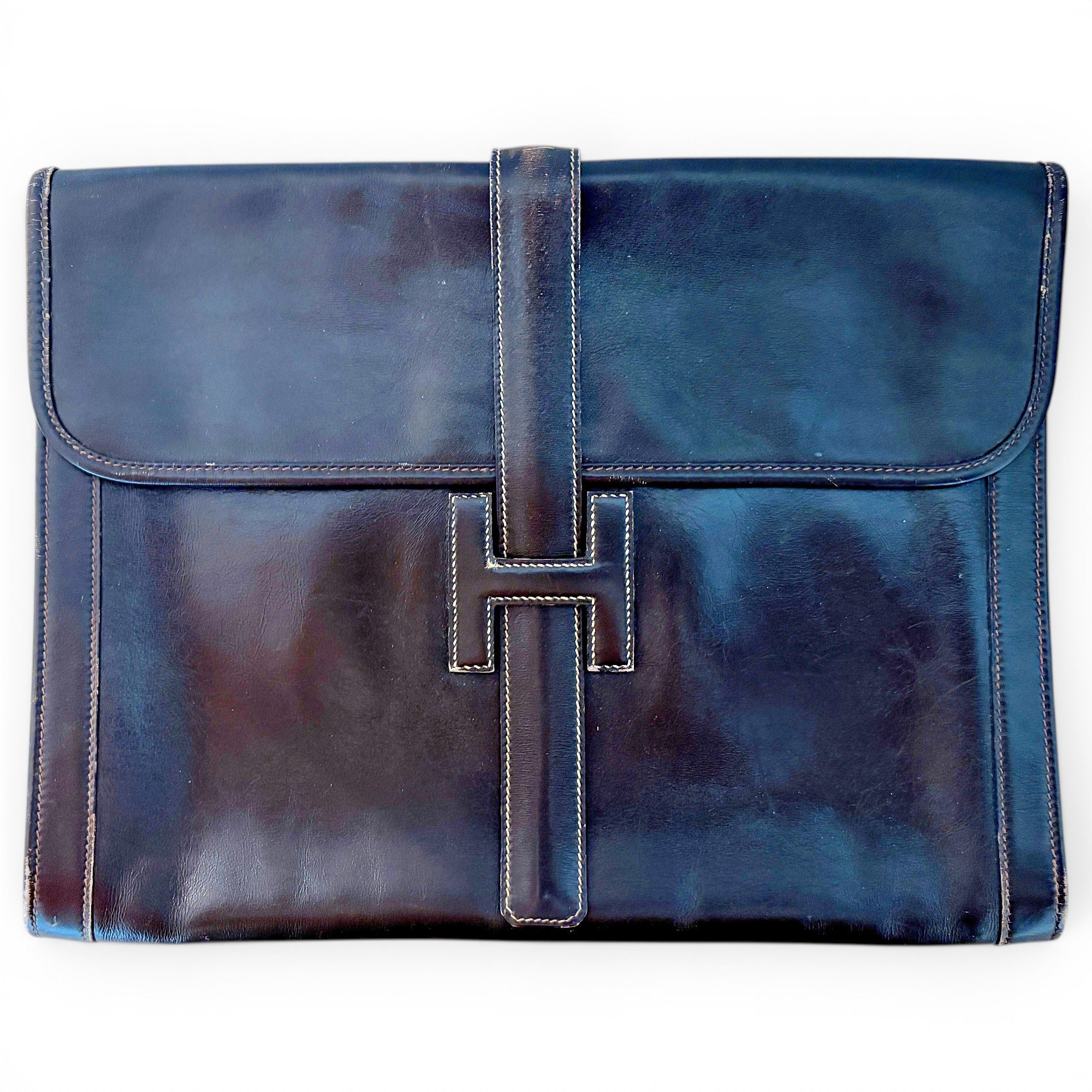 Jige leather clutch bag