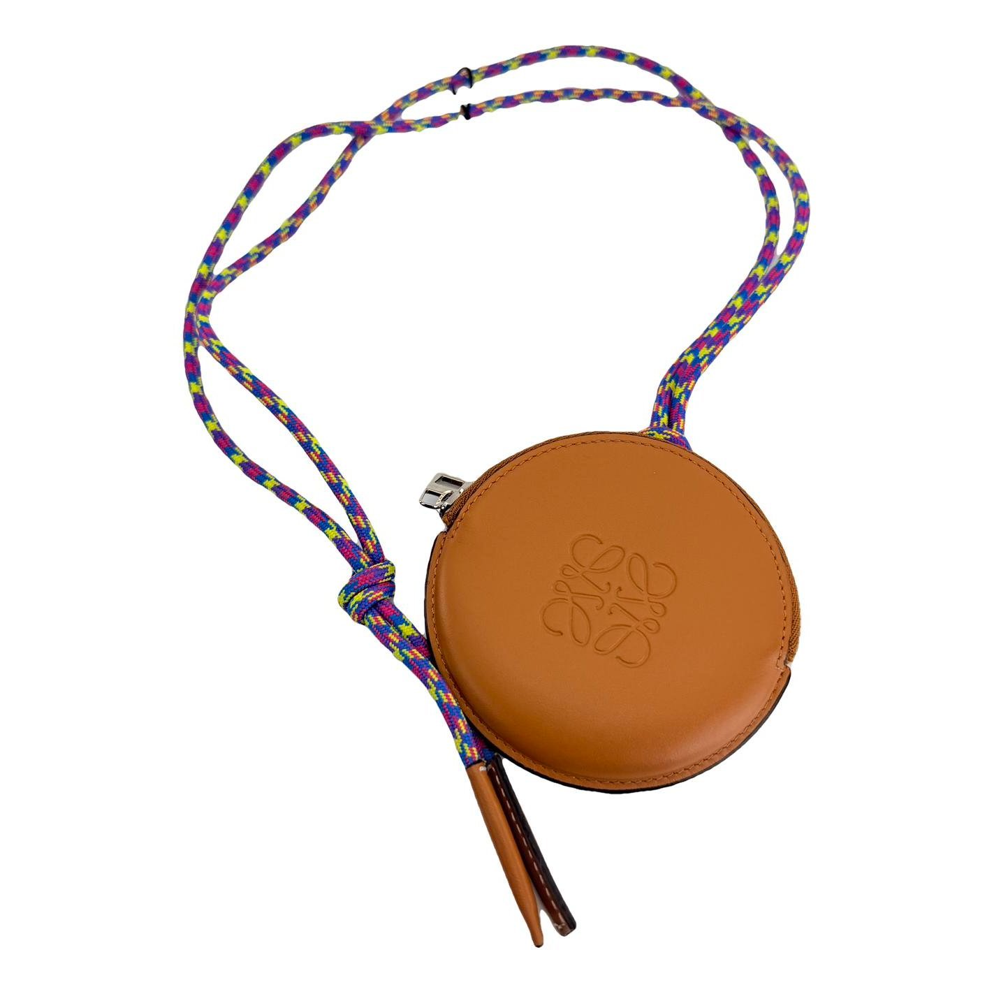 Puzzle leather clutch bag