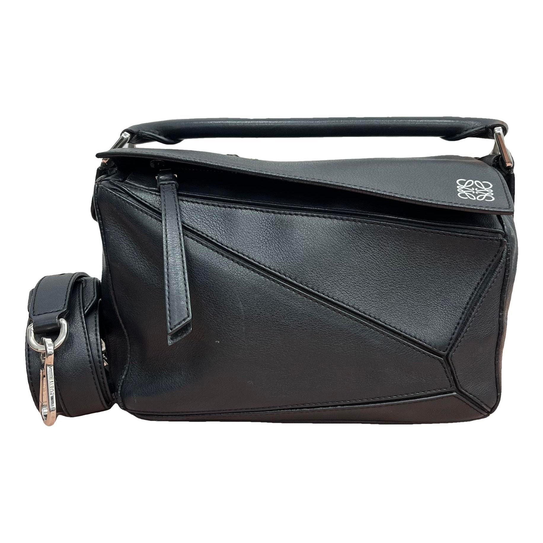 Puzzle leather handbag