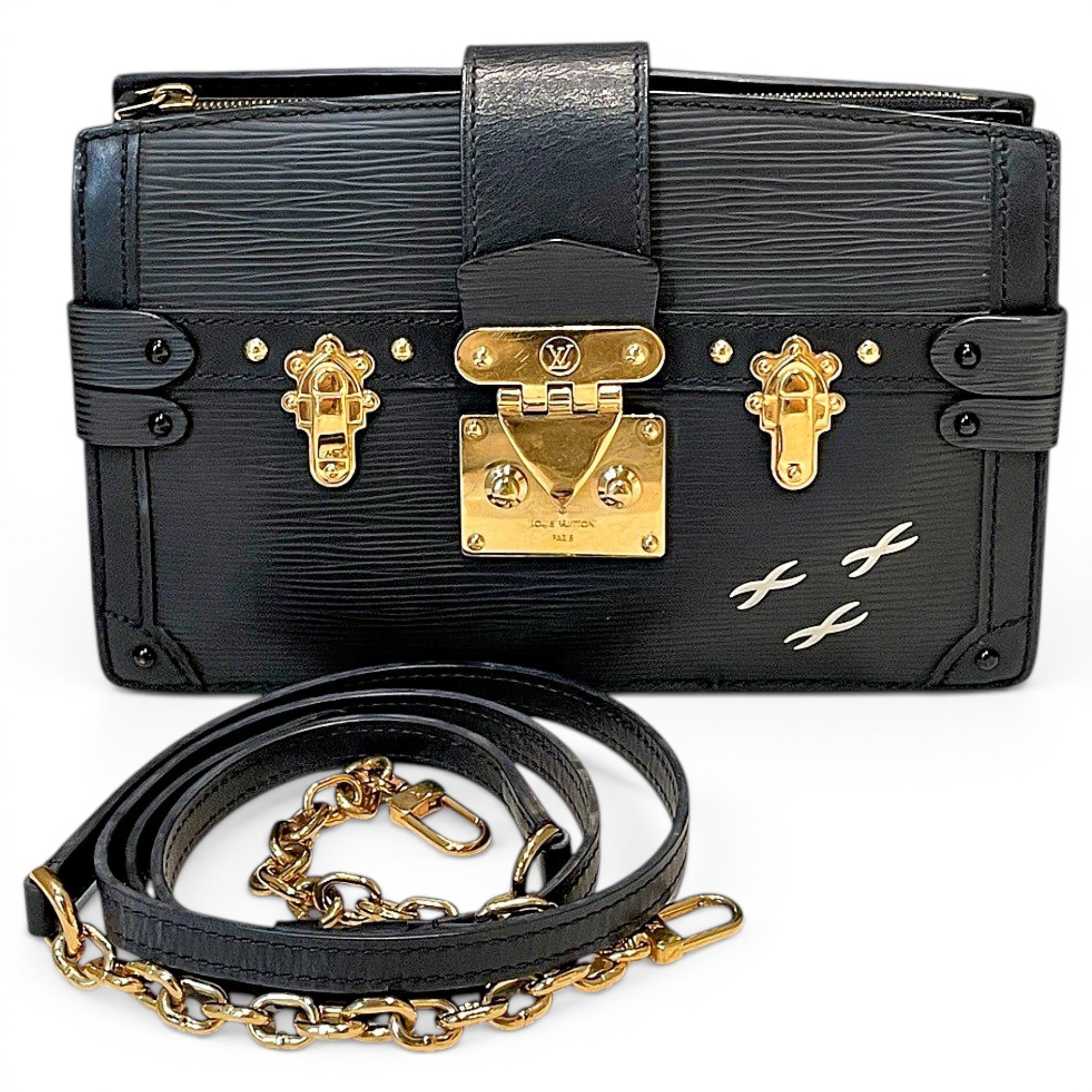 Pochette Trunk leather handbag