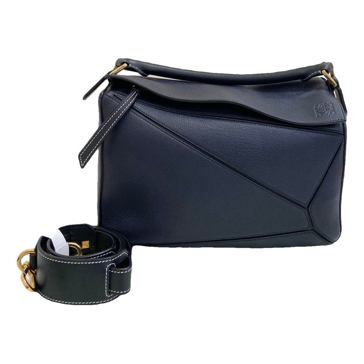Puzzle leather handbag
