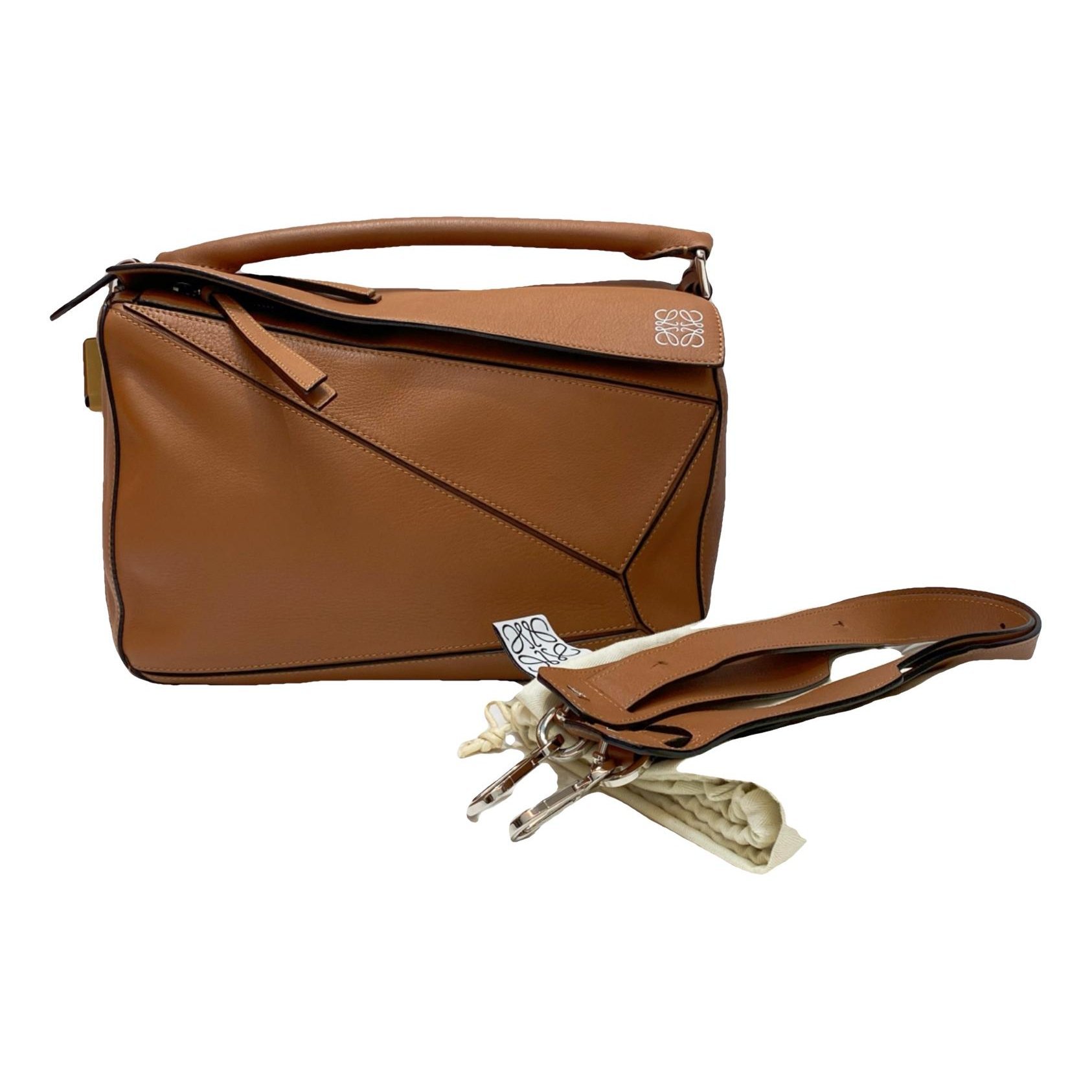 Puzzle leather handbag