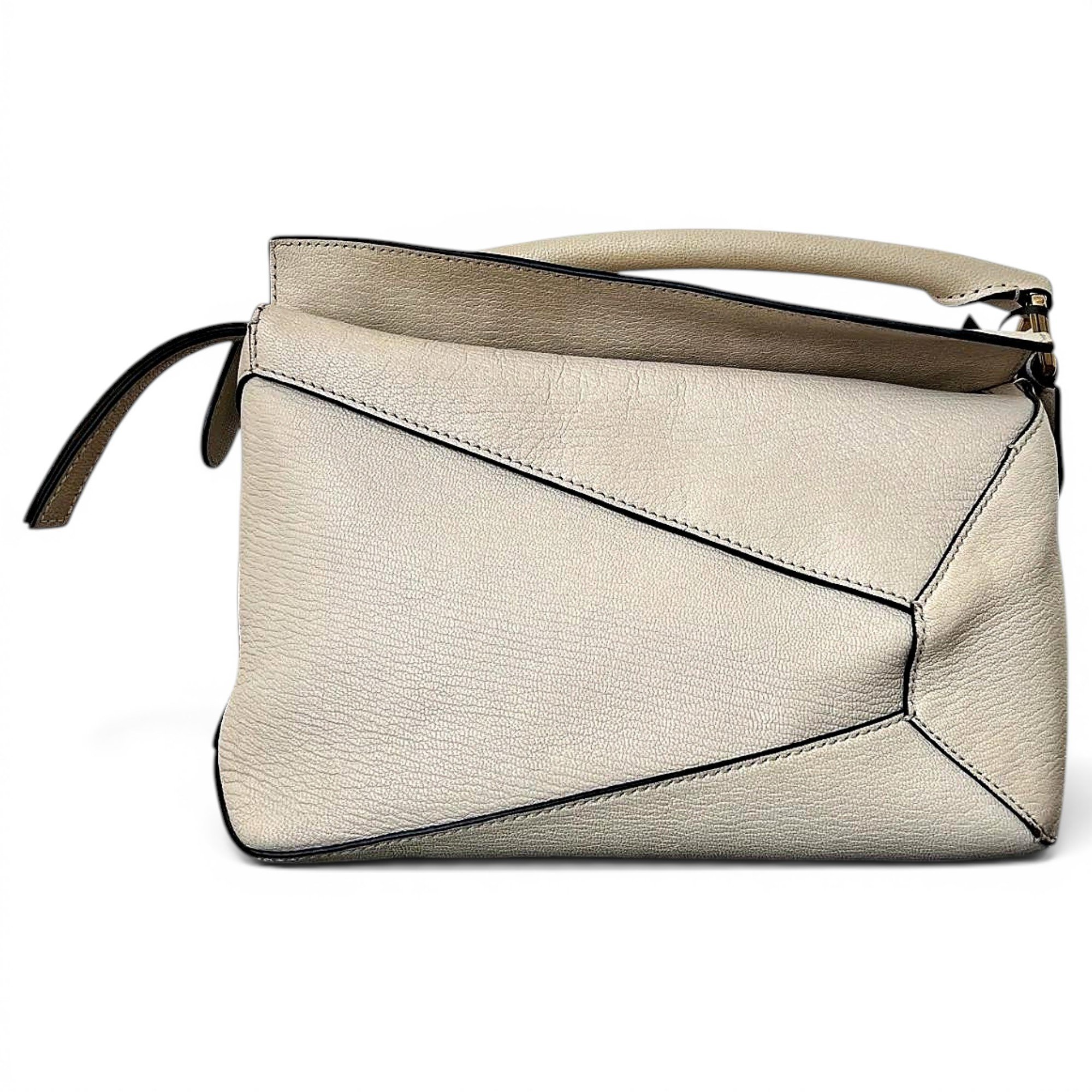Puzzle leather handbag