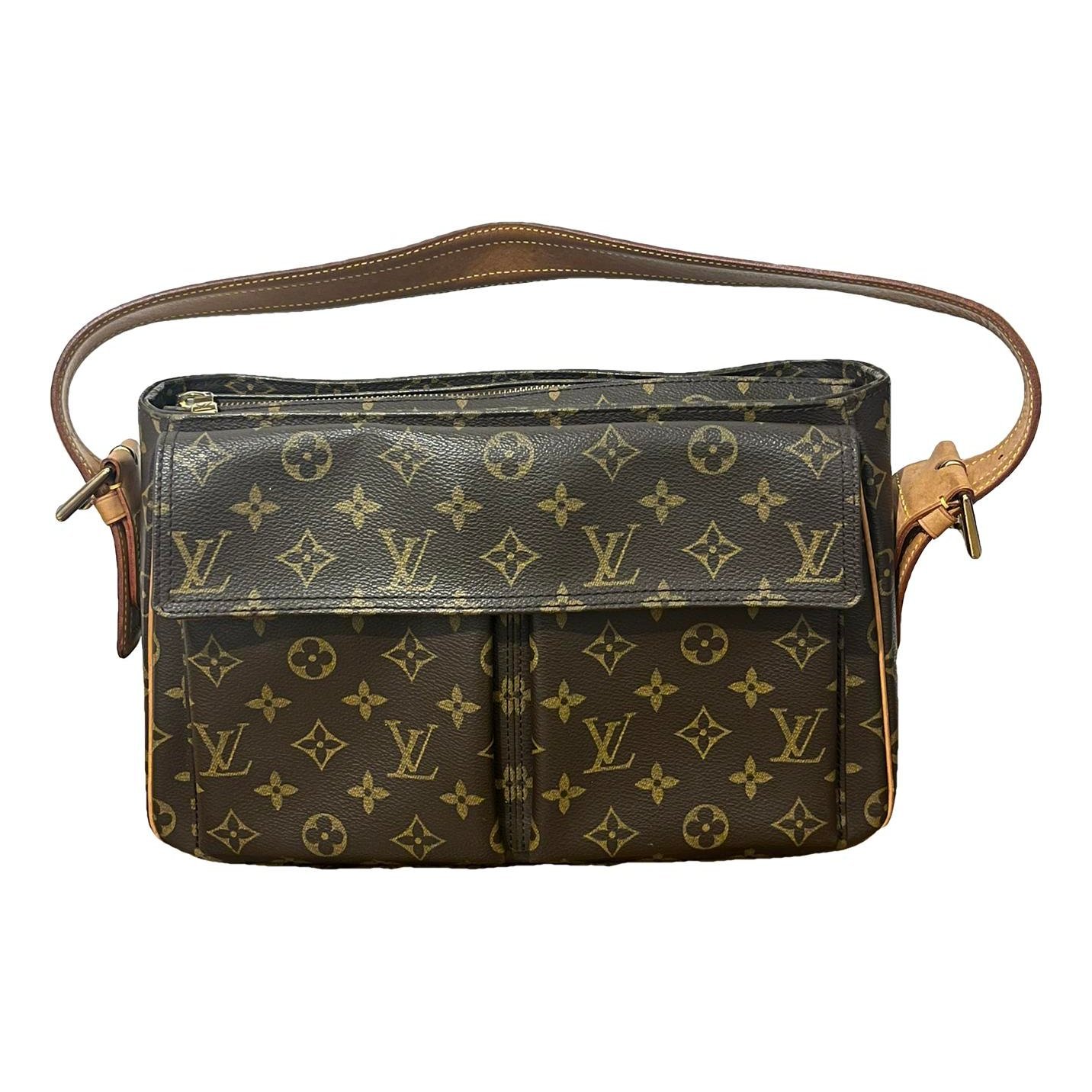 Louis Vuitton Viva Cité cloth handbag