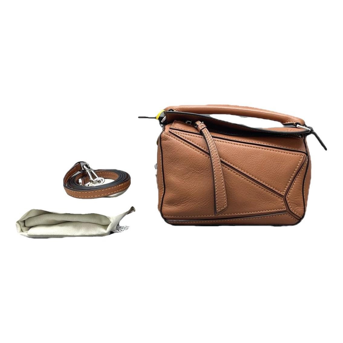 Puzzle leather handbag