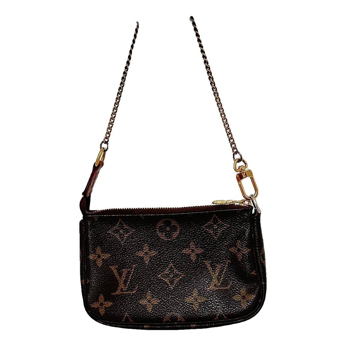 Pochette Accessoire leather handbag