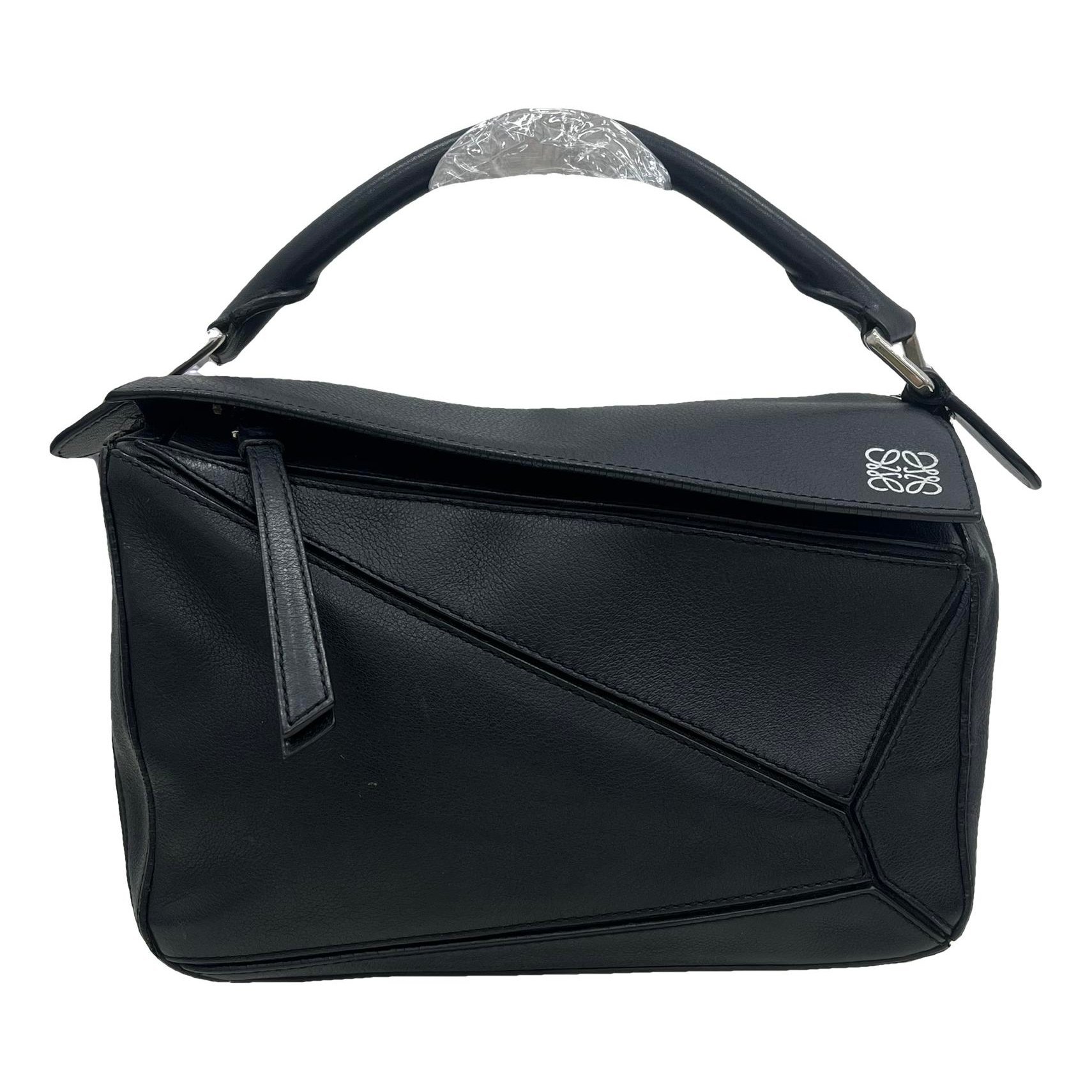 Puzzle leather handbag