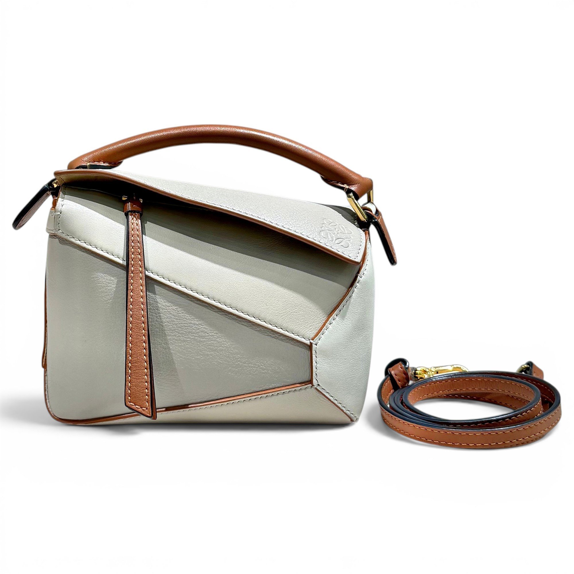 Puzzle leather handbag