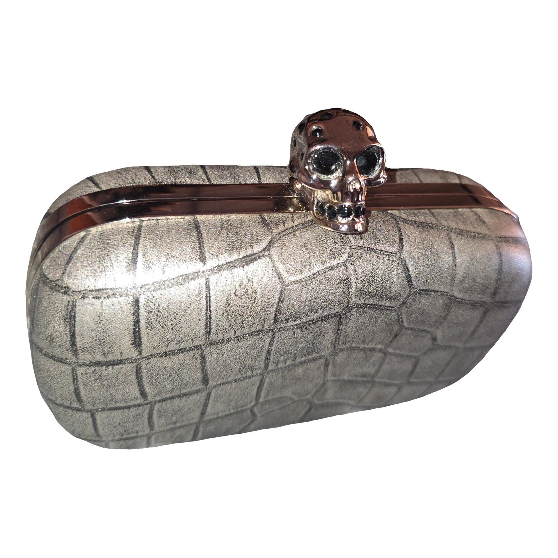 Alexander McQueen Skull leather clutch bag