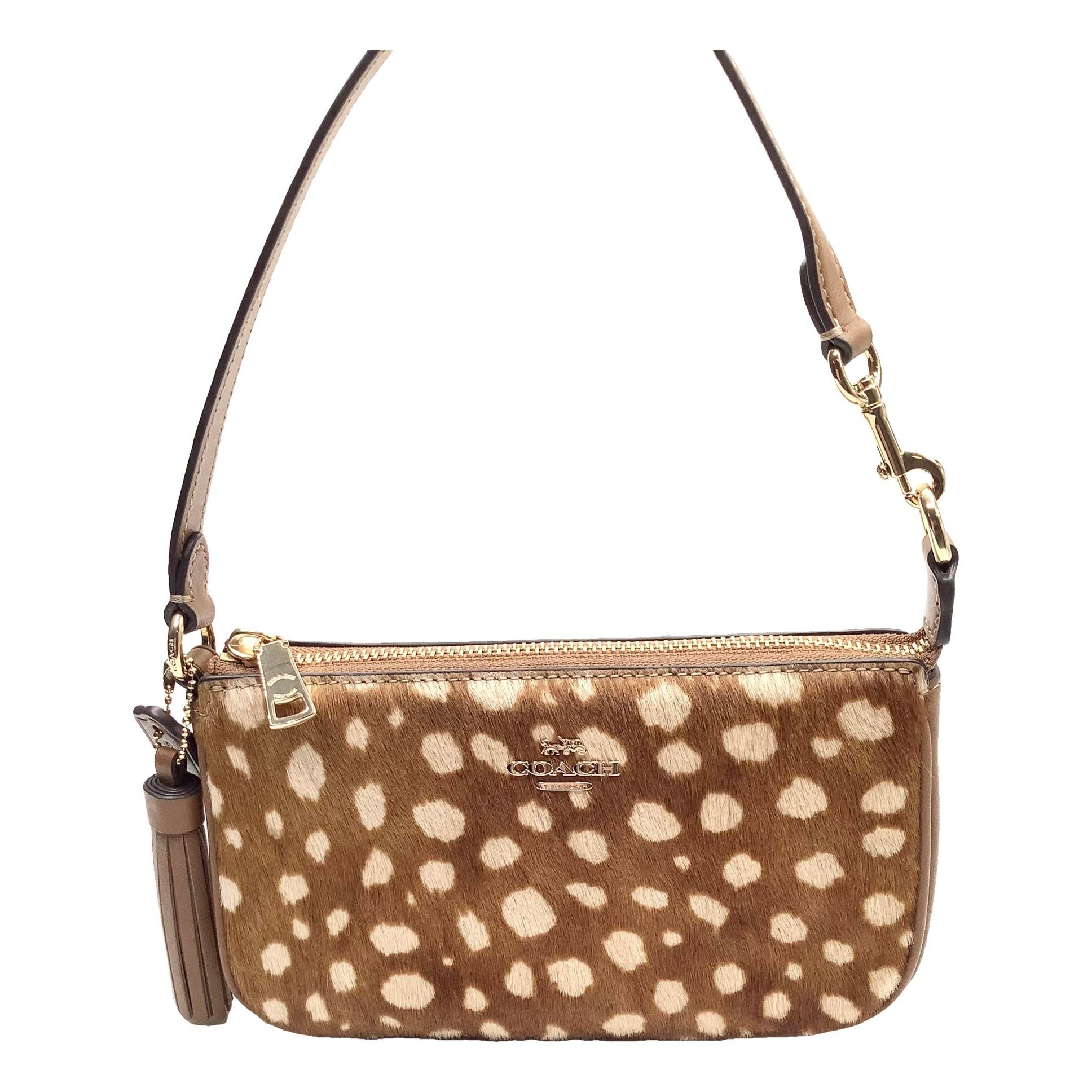 Pony-style calfskin clutch bag