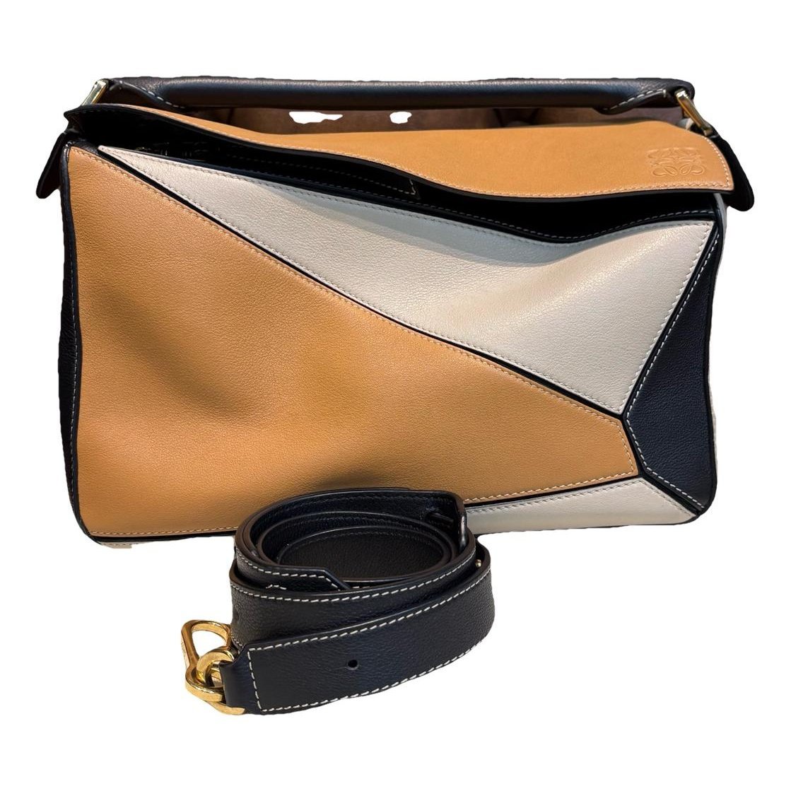 Puzzle leather handbag