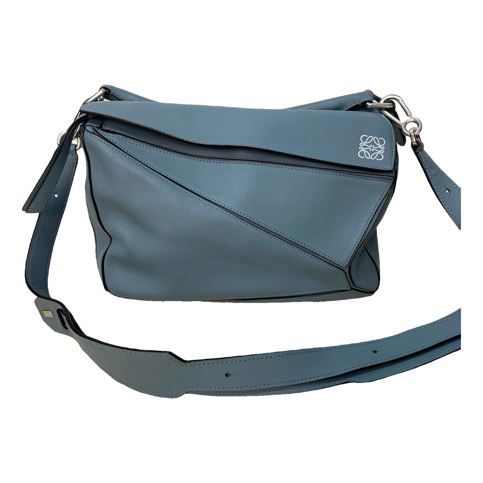 Puzzle leather handbag