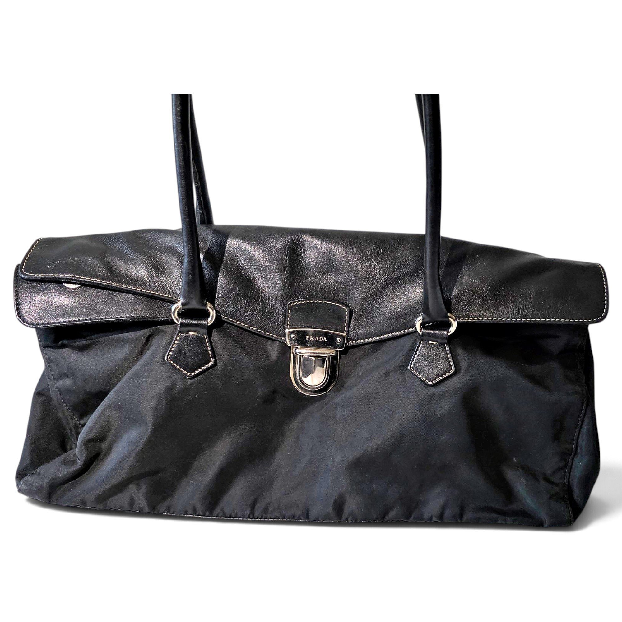 Buckle leather handbag