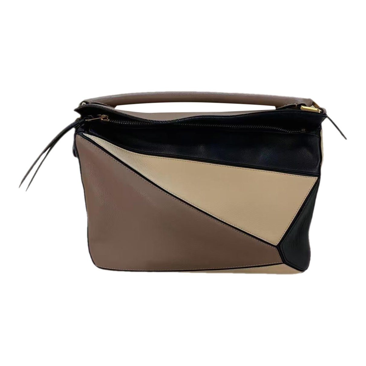 Puzzle leather handbag