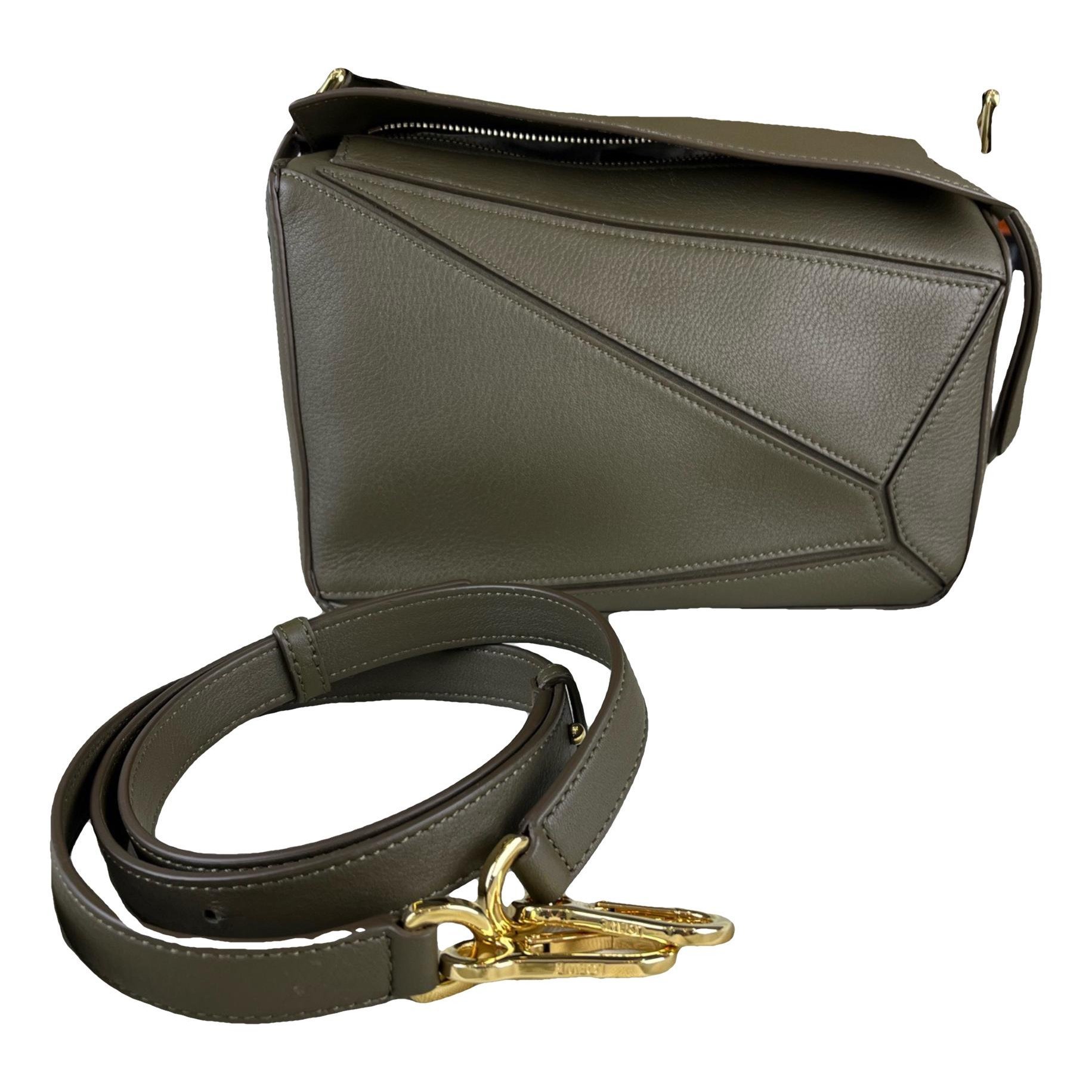 Puzzle leather handbag