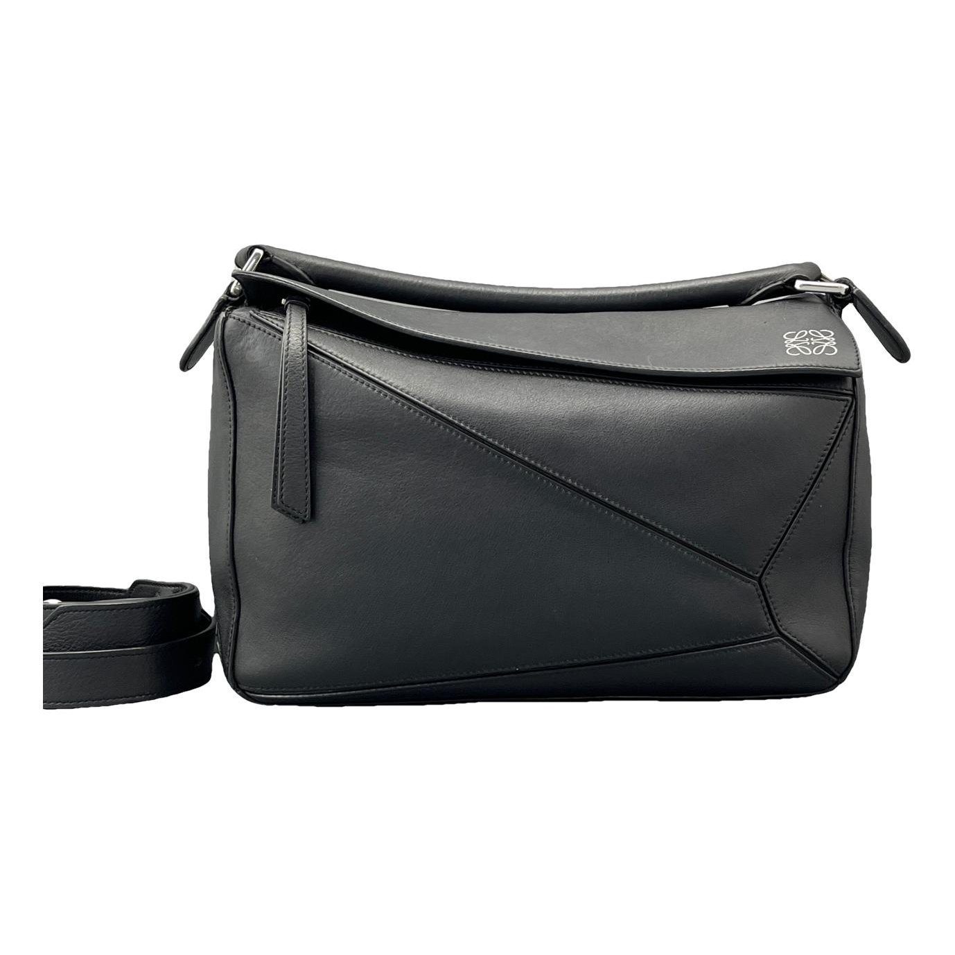 Puzzle leather handbag
