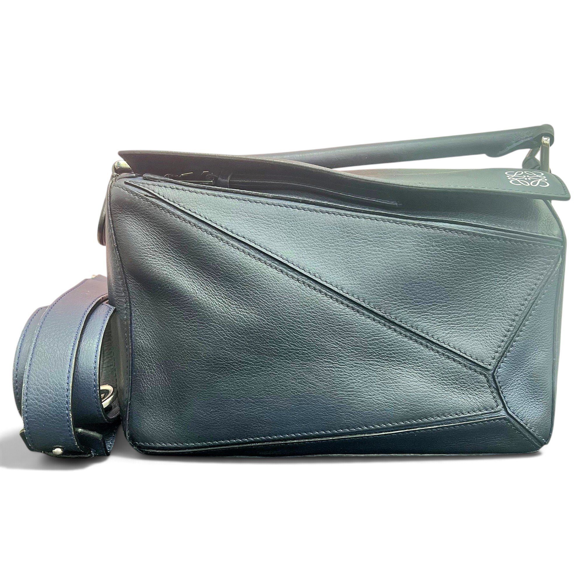 Puzzle leather handbag