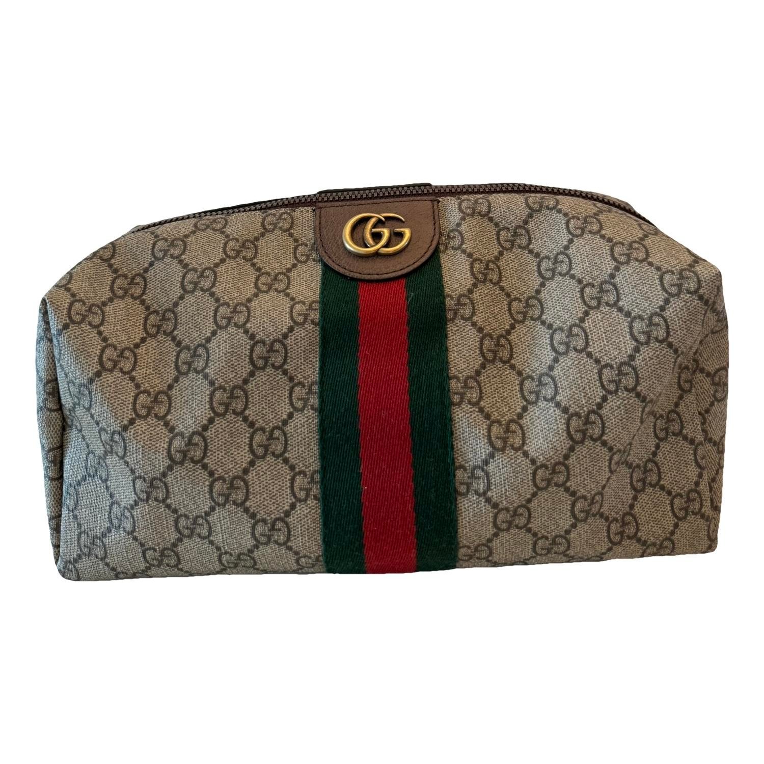 Ophidia clutch bag