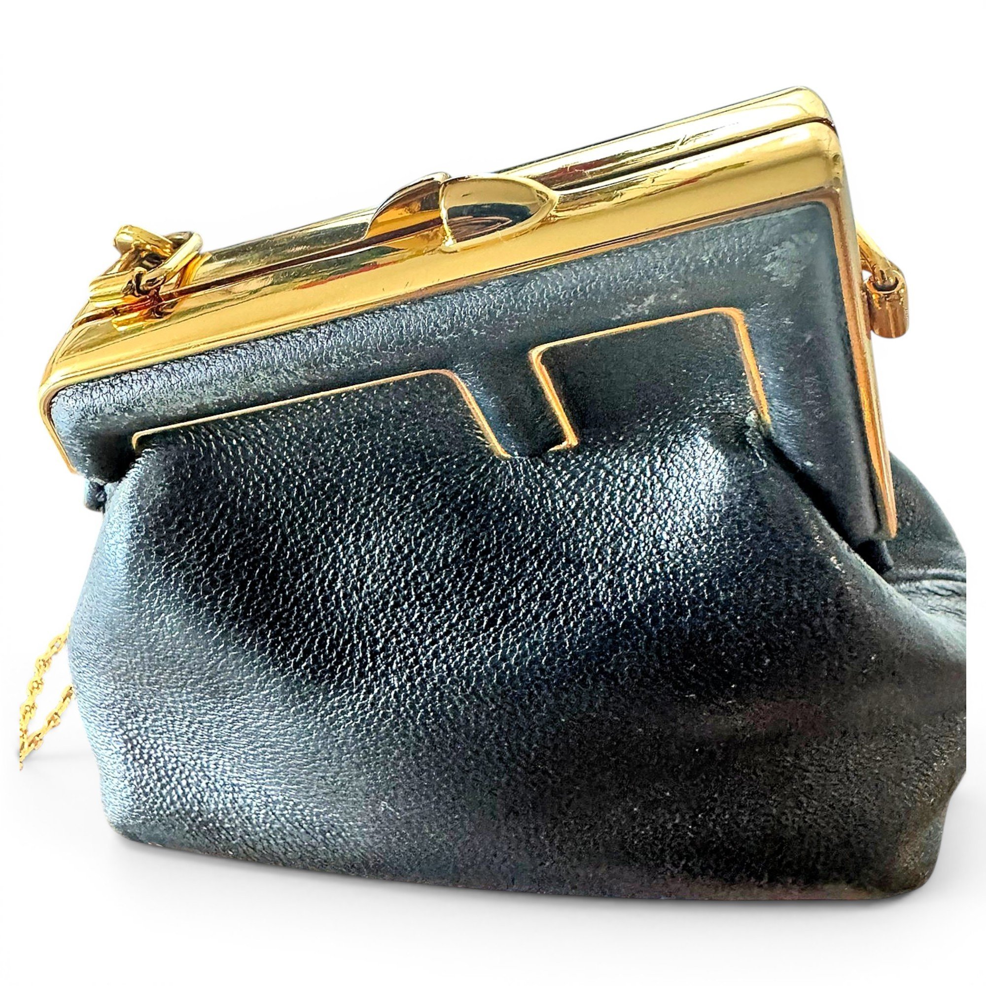 First leather mini bag