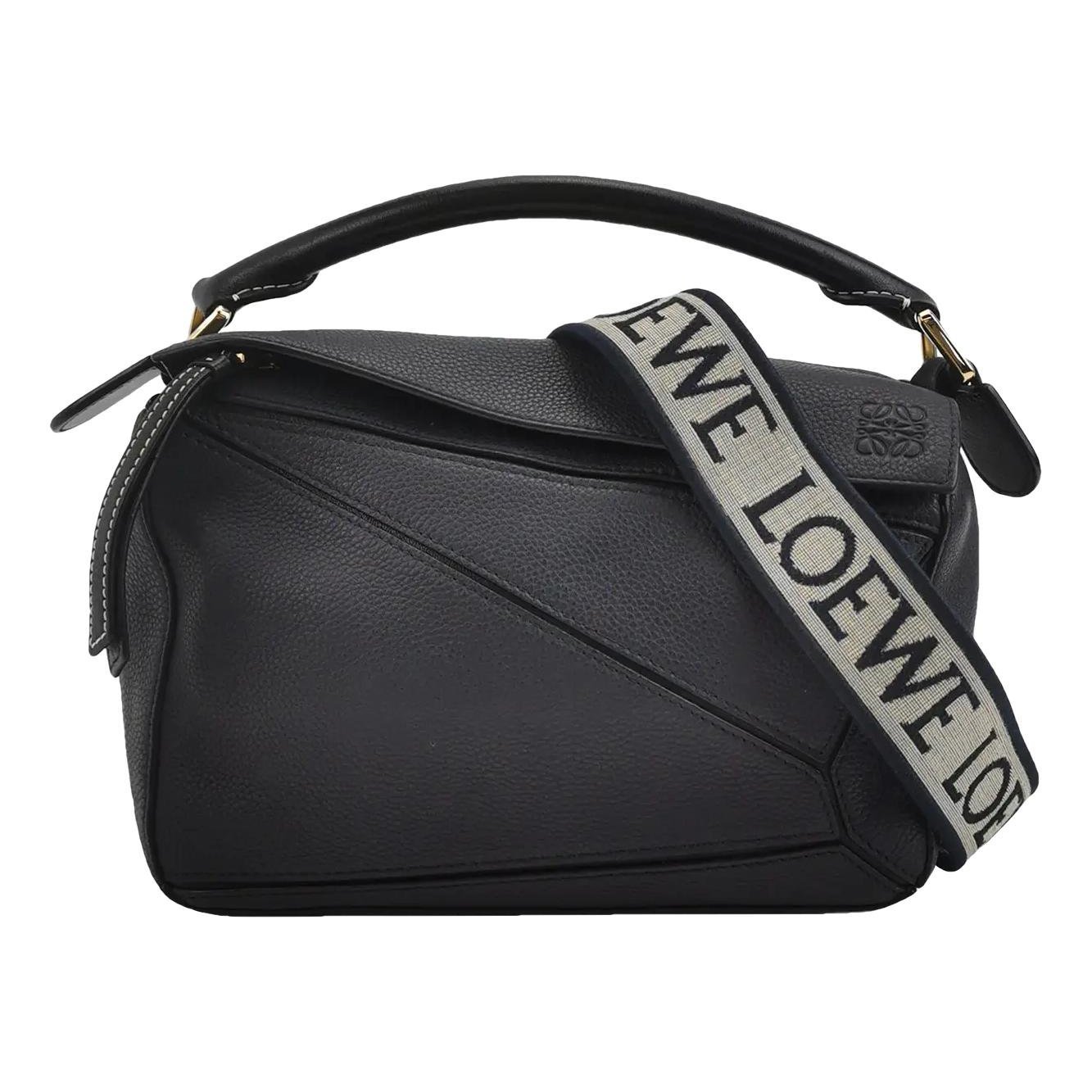 Puzzle leather handbag