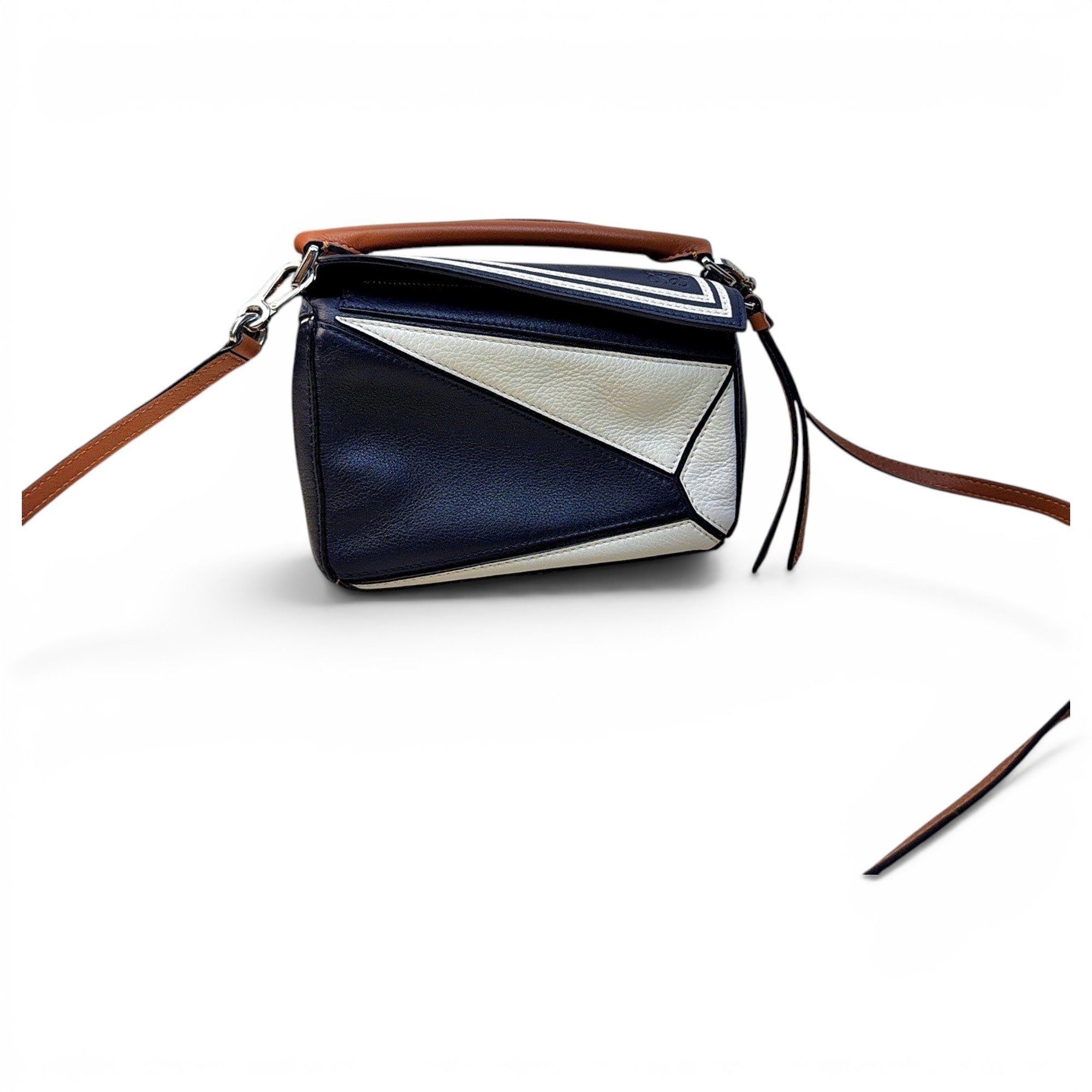 Puzzle leather handbag