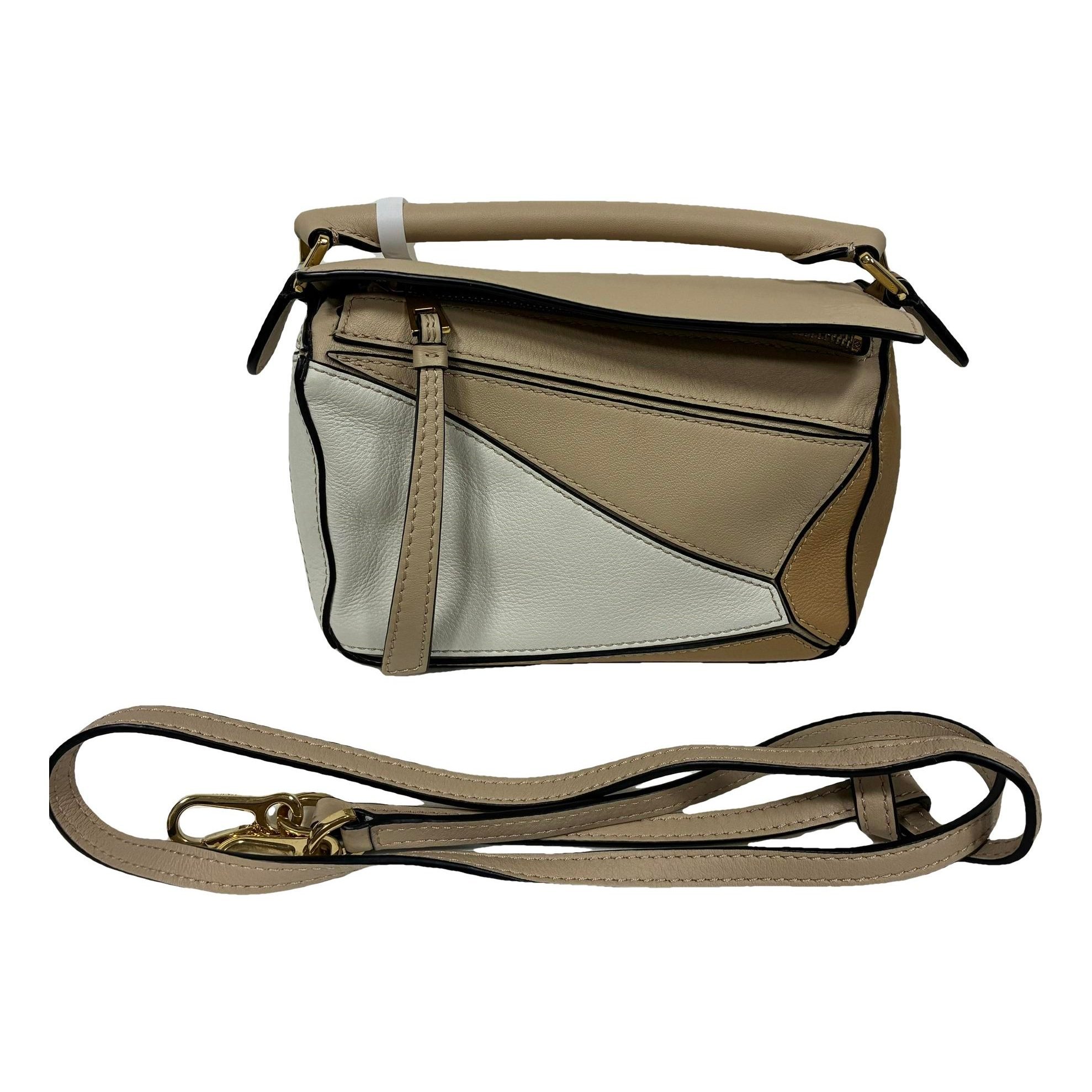 Puzzle leather handbag