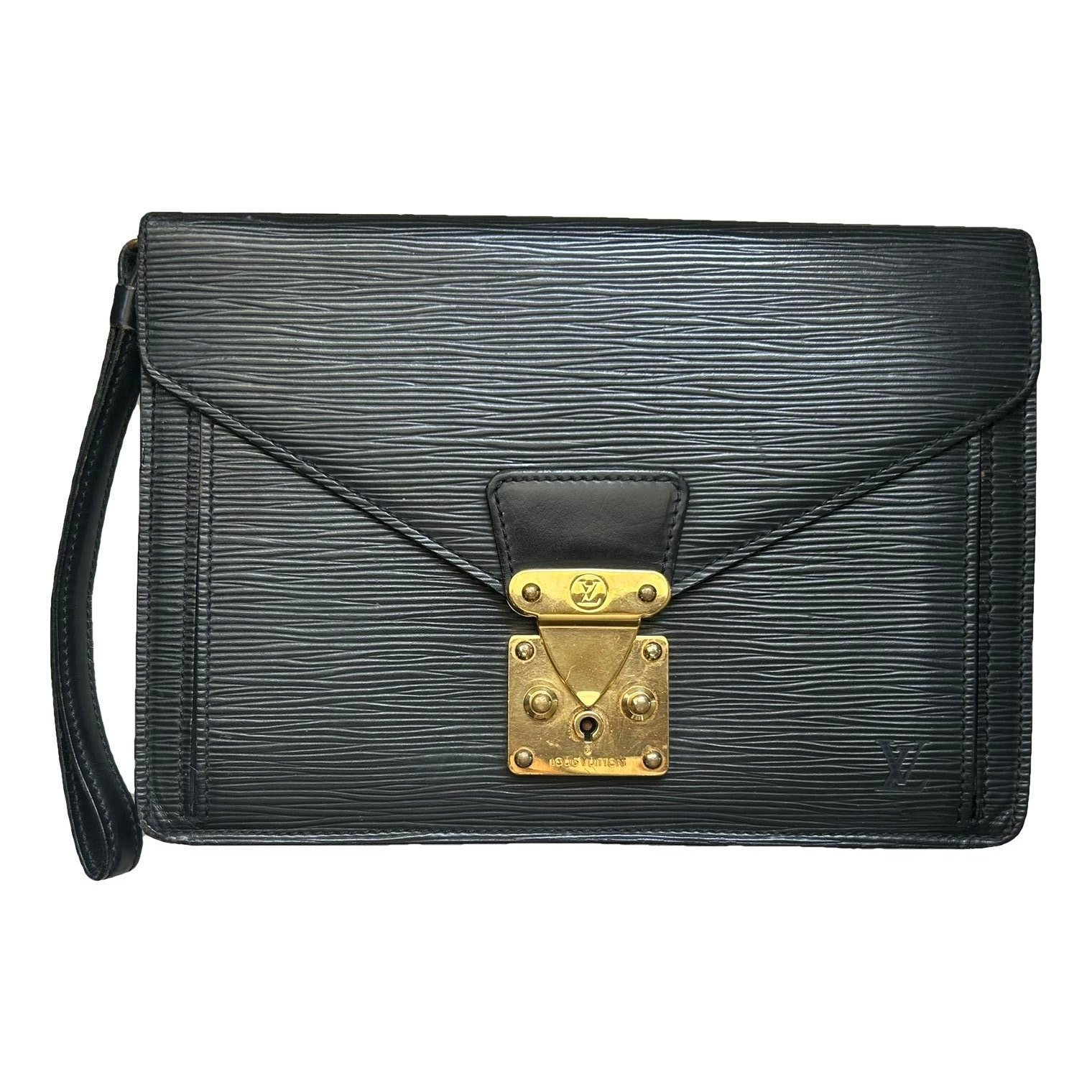 Sellier leather clutch bag