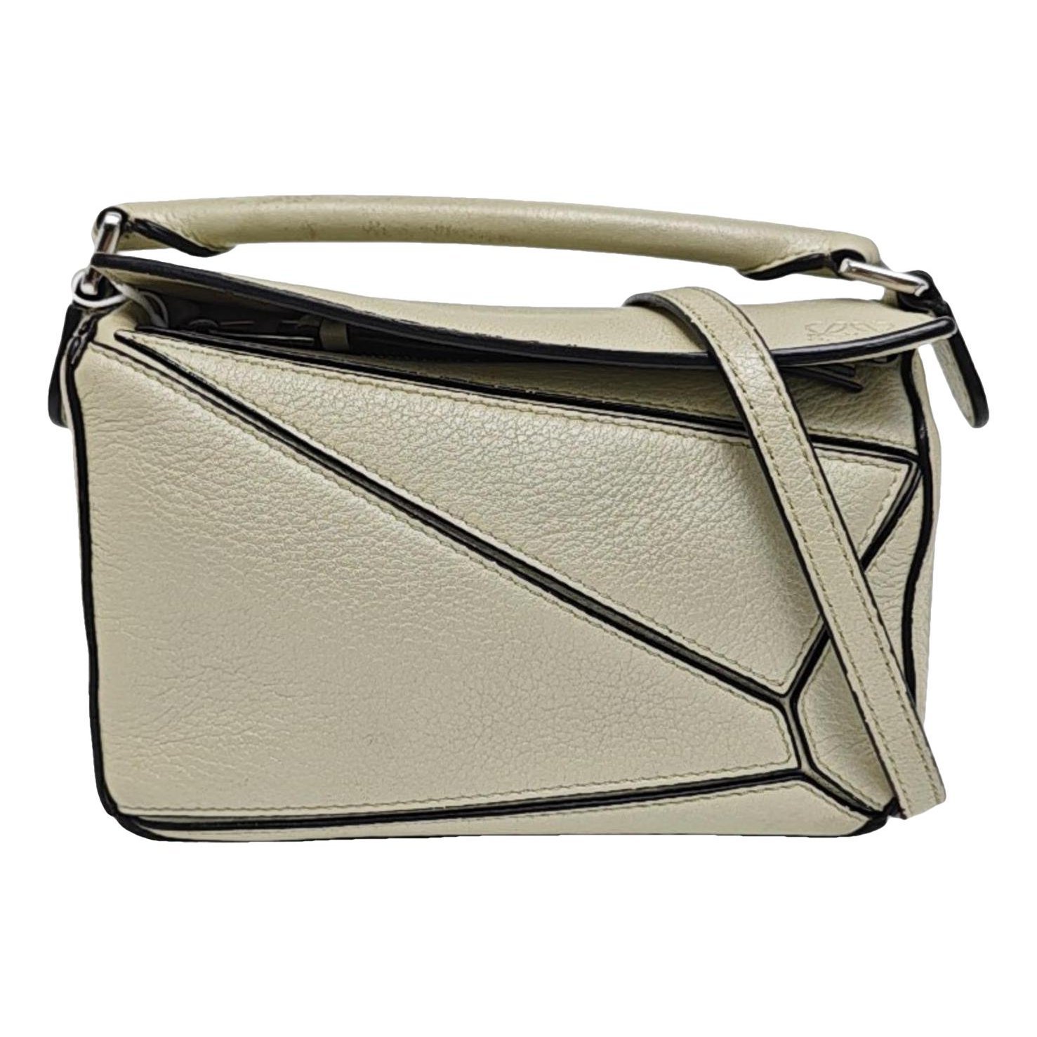 Puzzle leather handbag