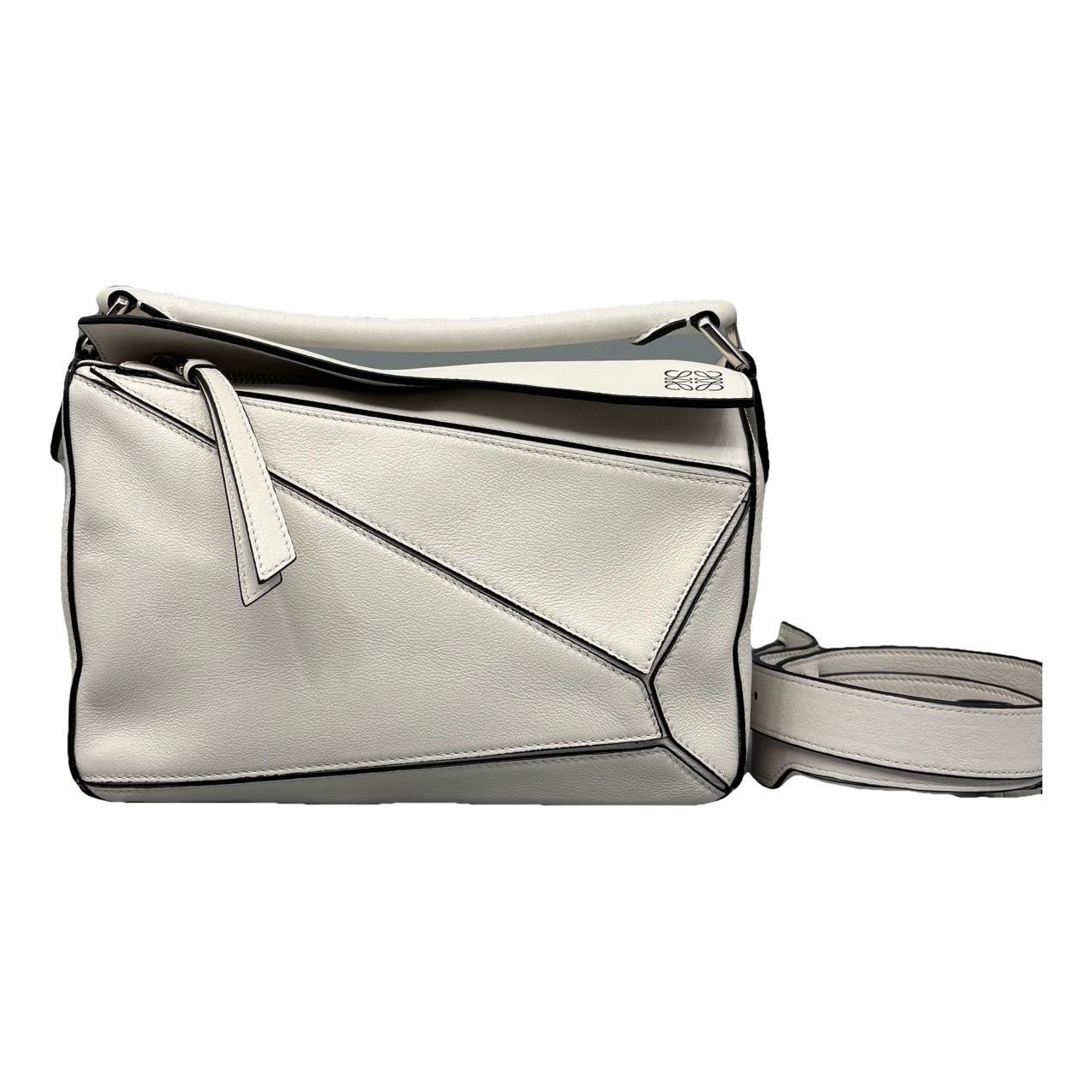 Puzzle leather handbag