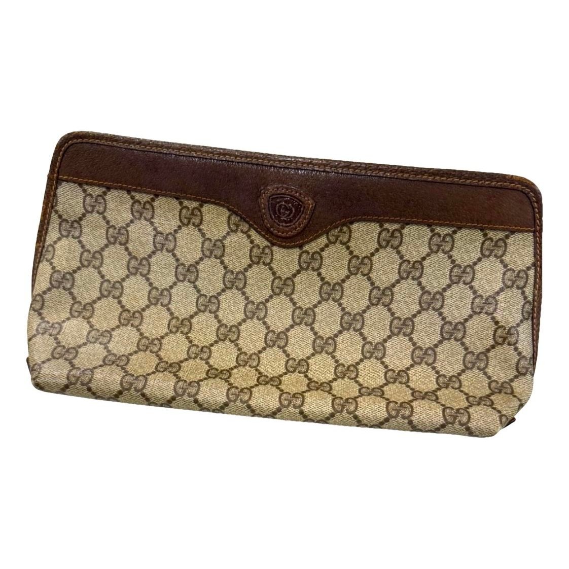 Ophidia leather clutch bag