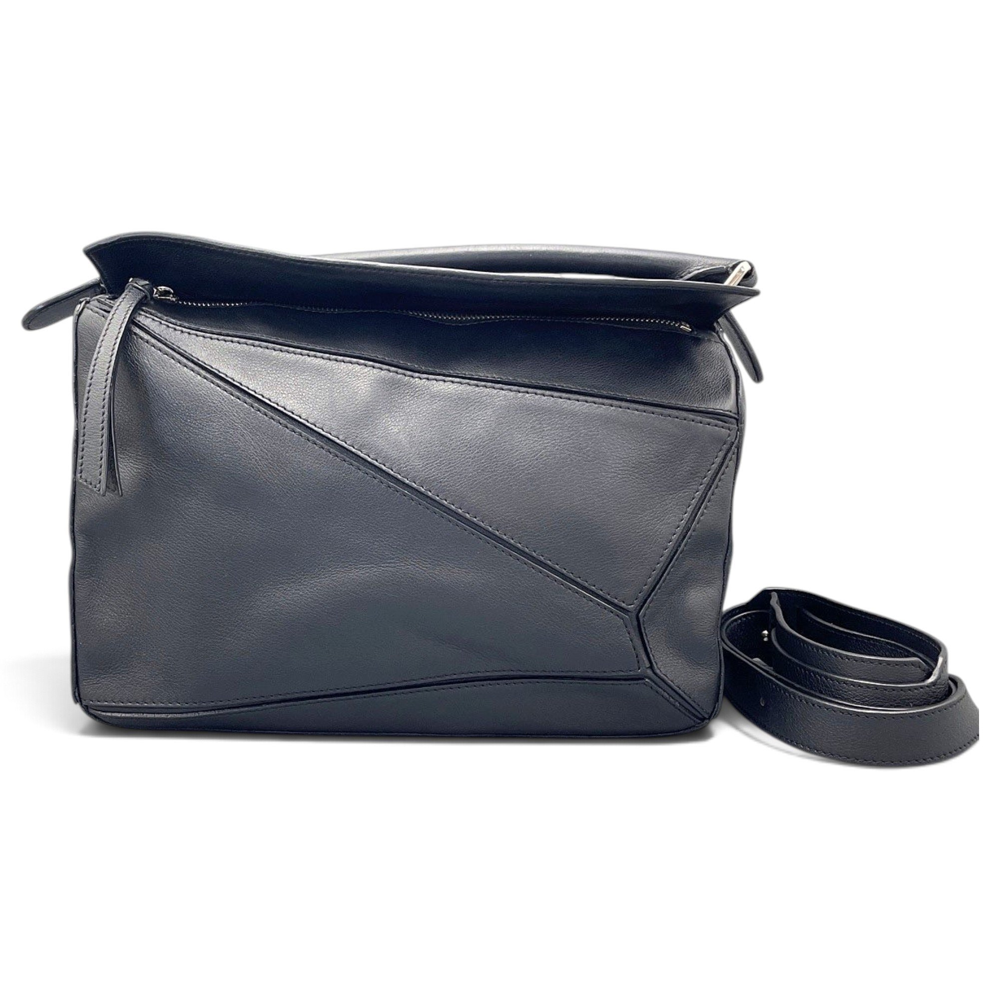 Puzzle leather handbag