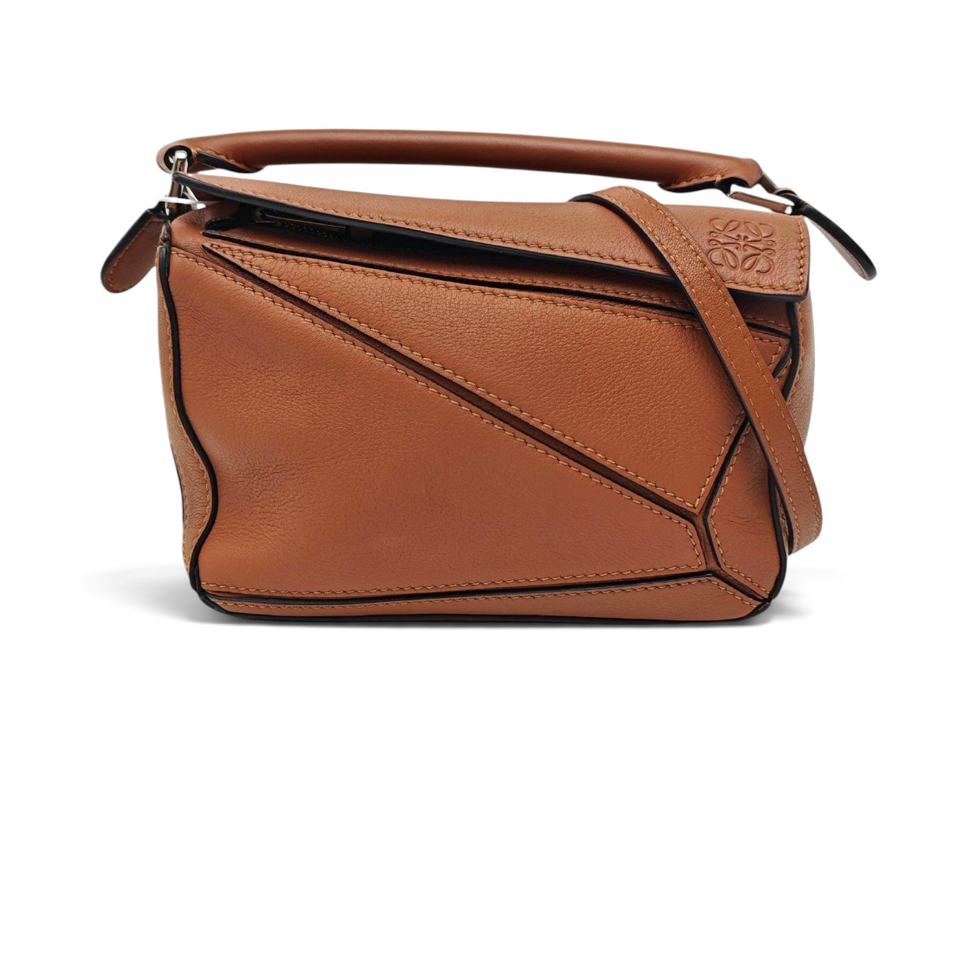 Puzzle leather handbag
