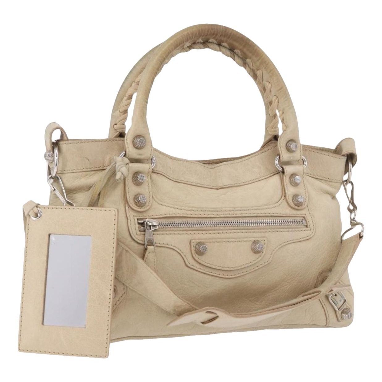 First leather handbag