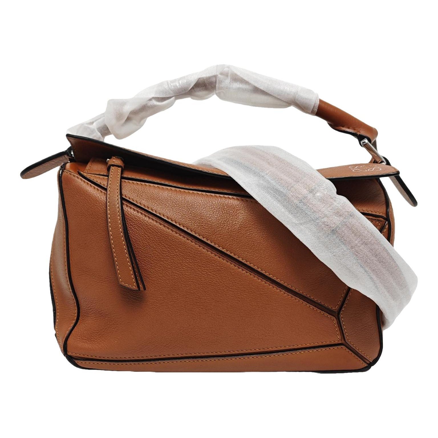 Puzzle leather handbag