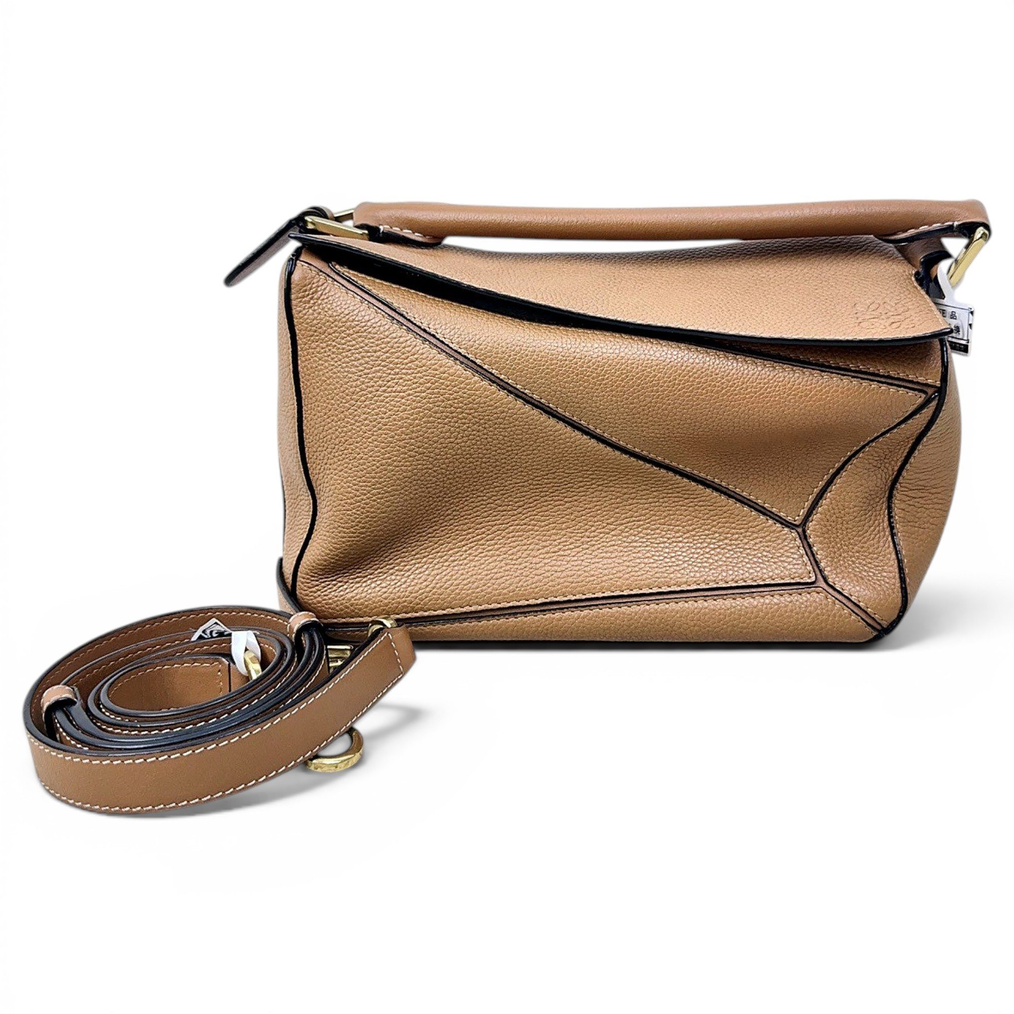 Puzzle leather handbag