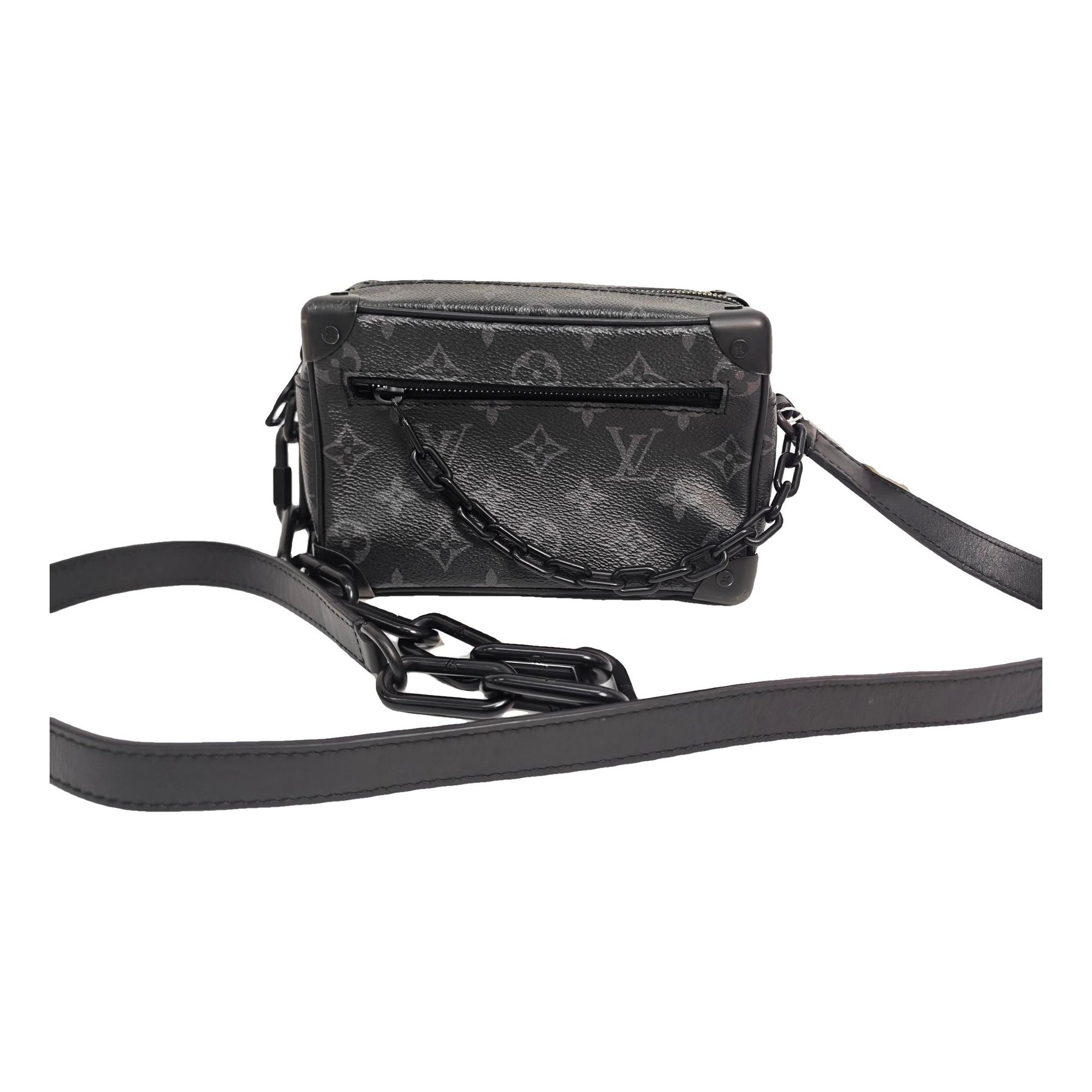 Pochette Trunk leather handbag