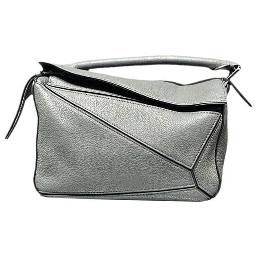 Puzzle leather handbag