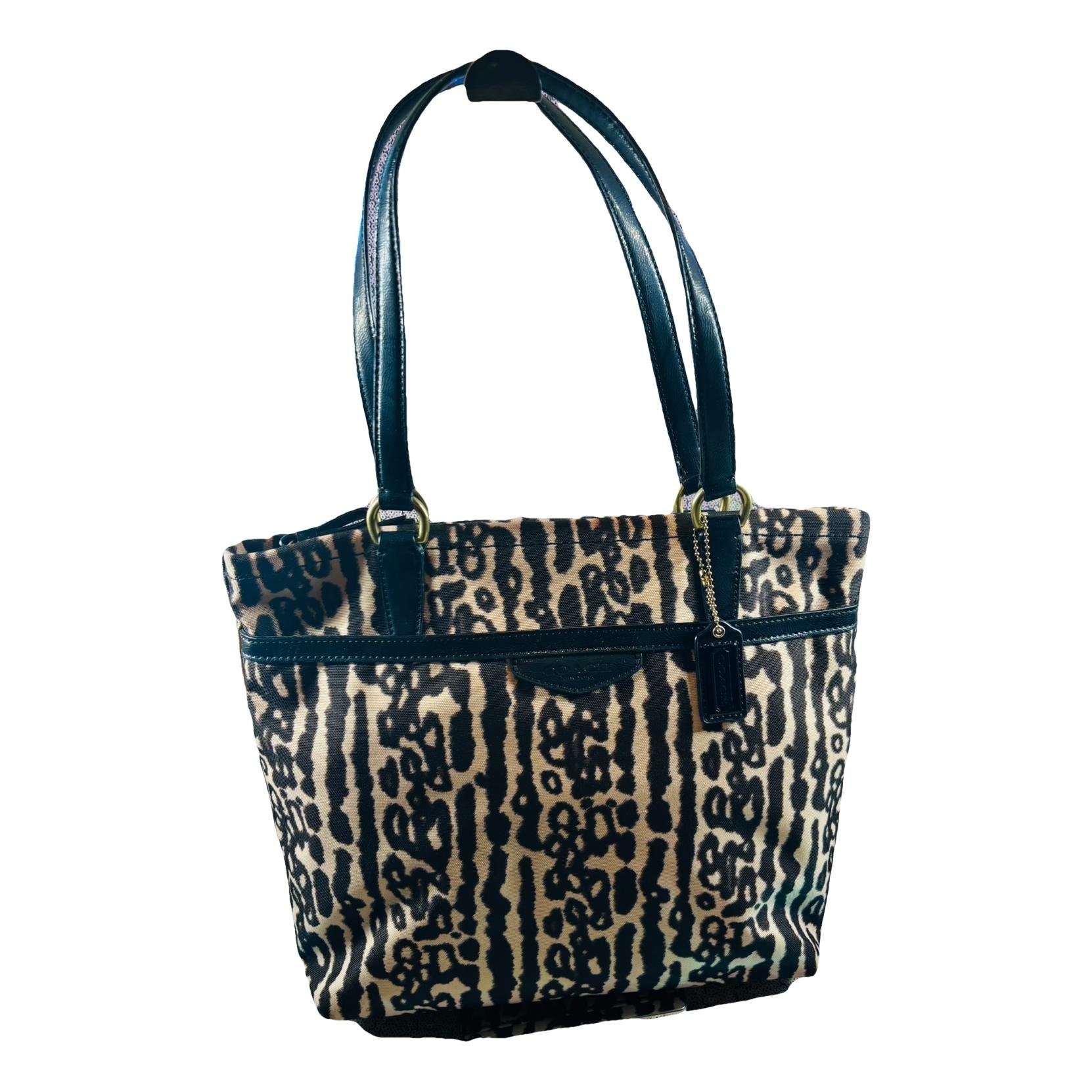 Signature Sufflette cloth handbag