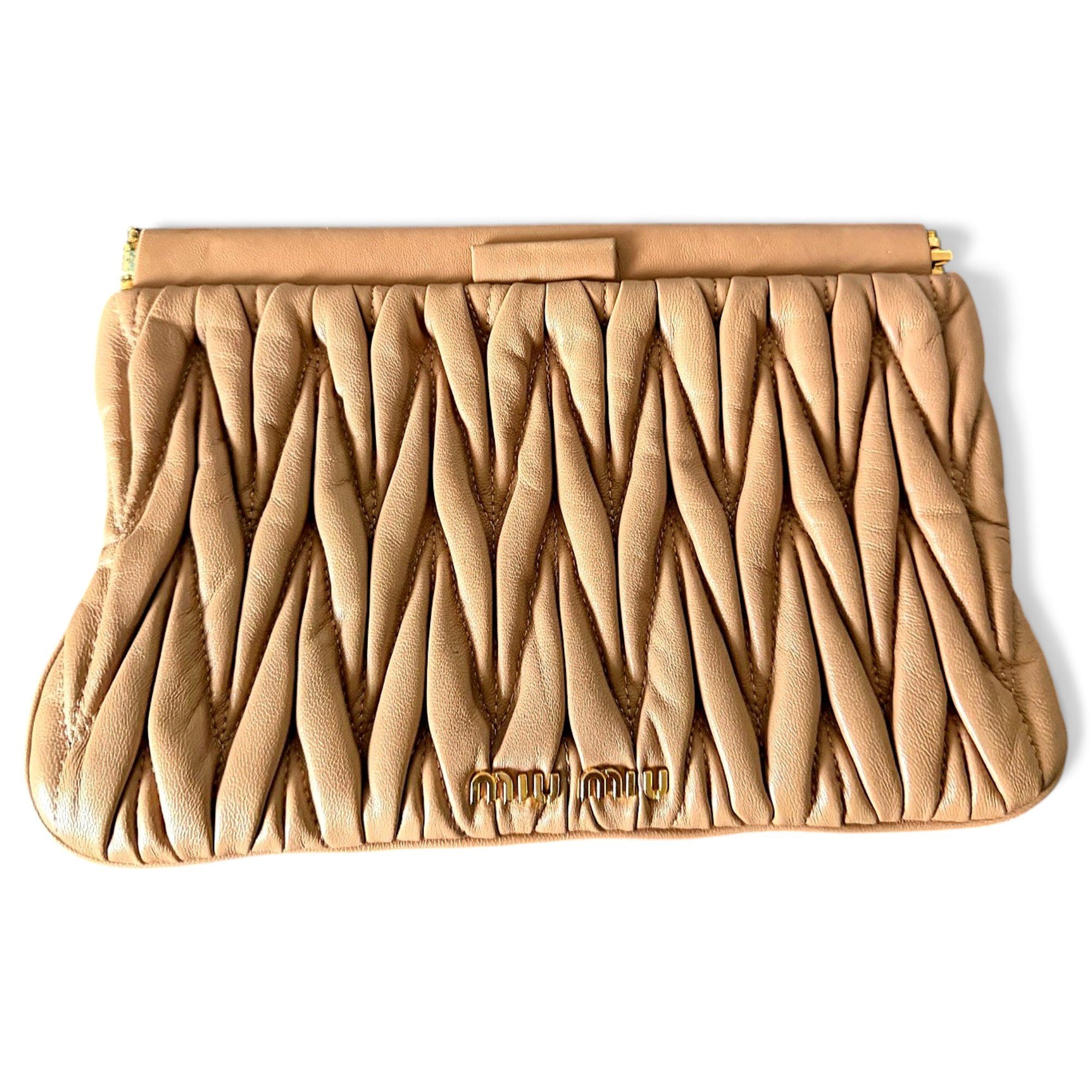 Matelassé leather clutch bag