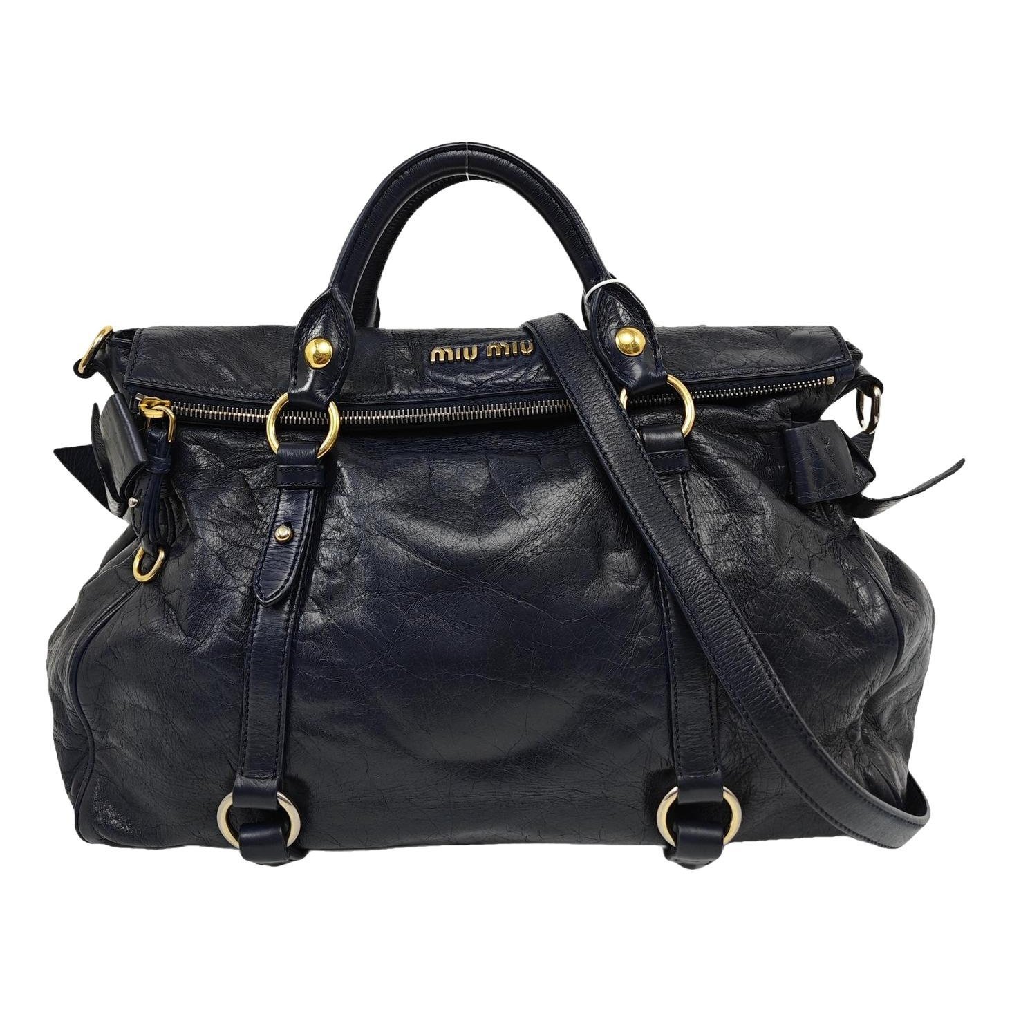 Bow bag leather handbag