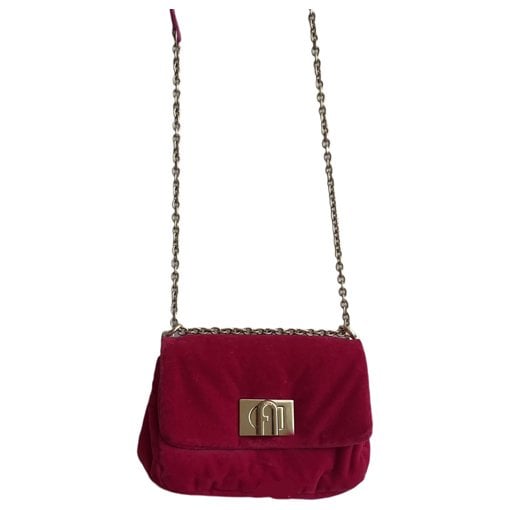 Metropolis velvet clutch bag