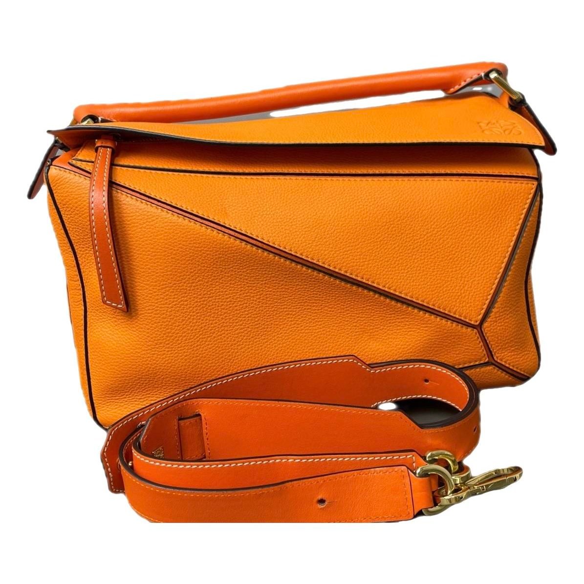 Puzzle leather handbag