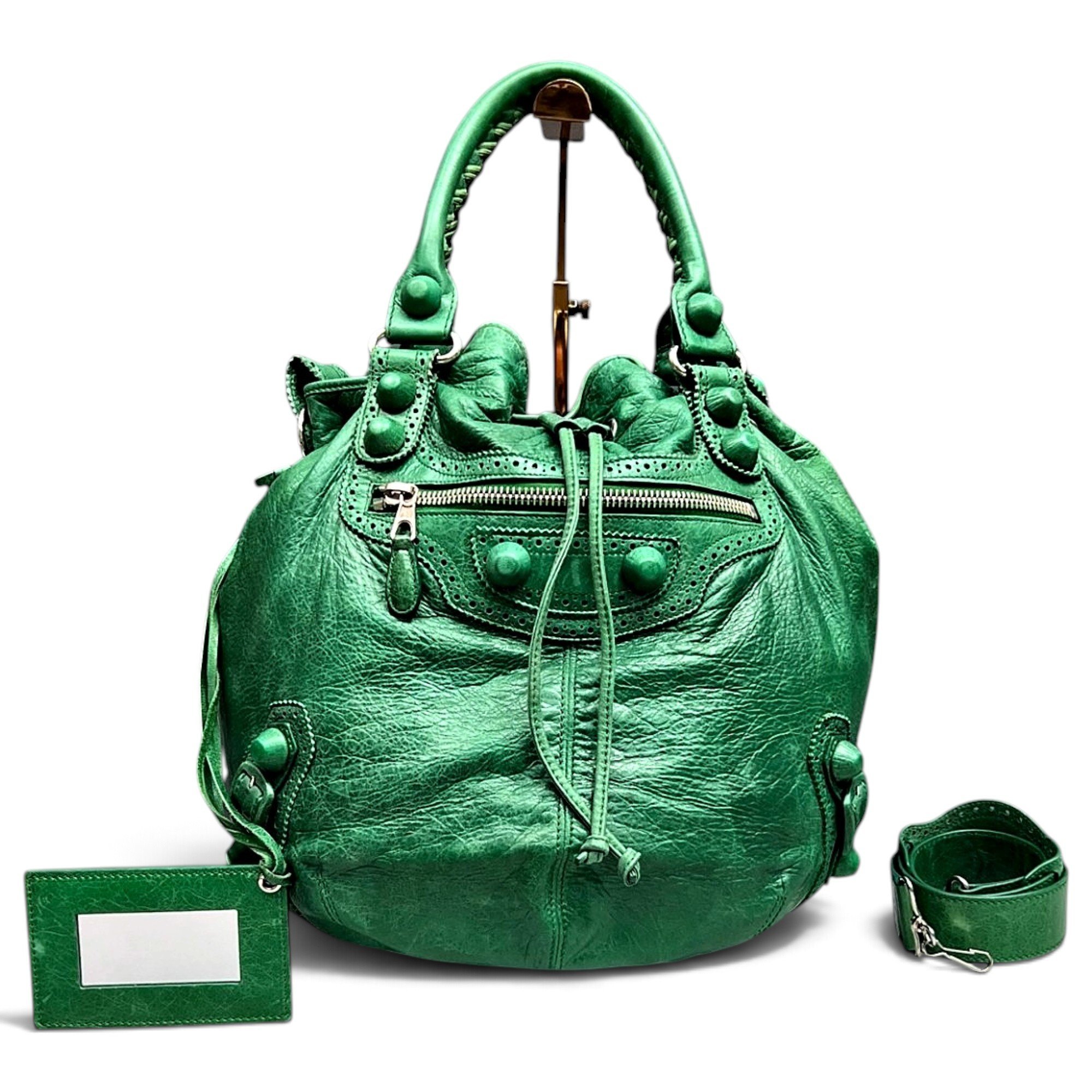 Pompon leather handbag
