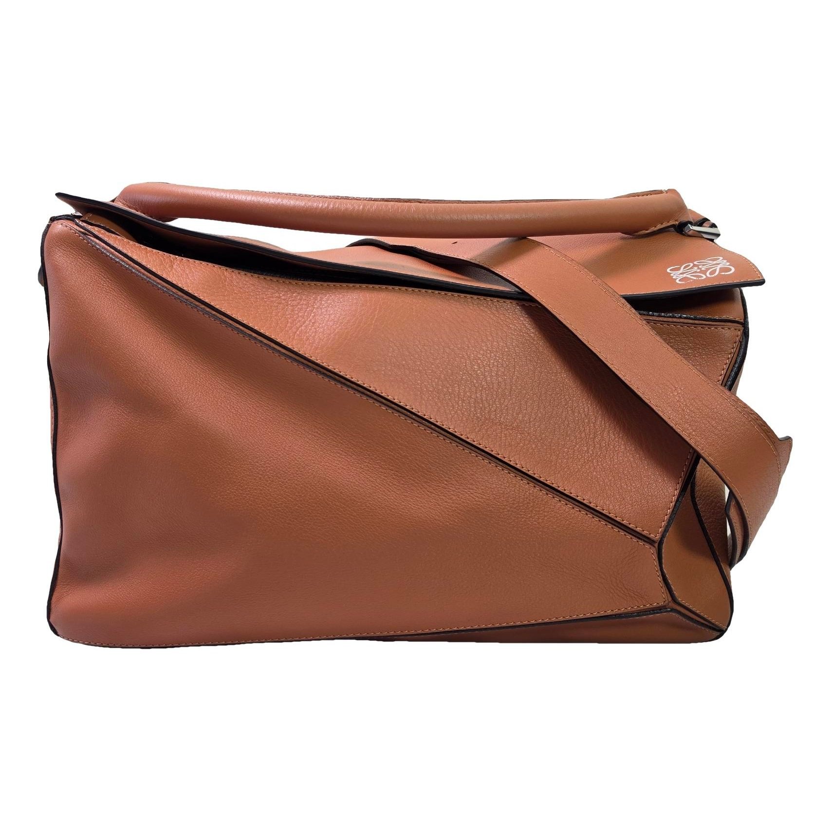 Puzzle leather handbag