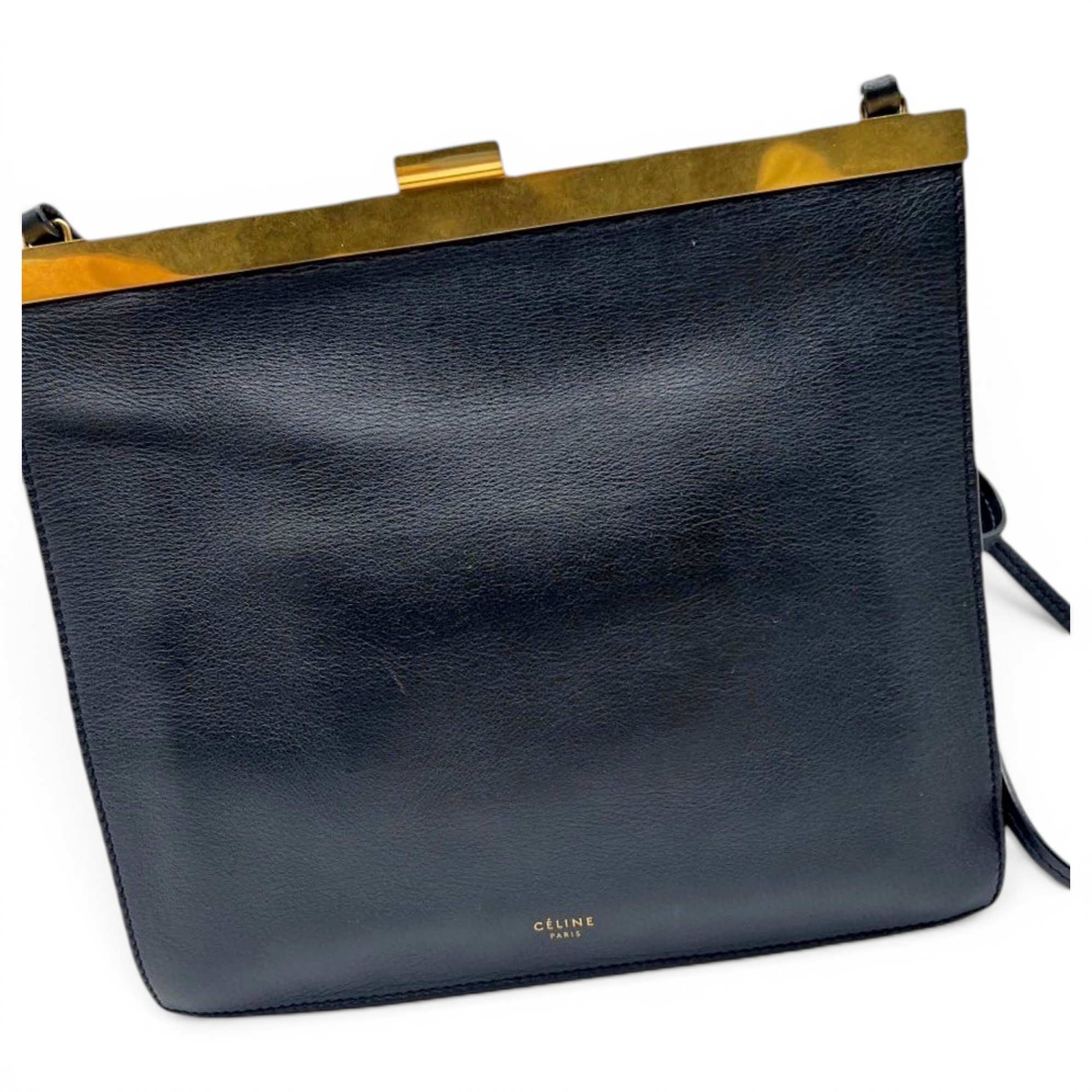 Clasp leather handbag
