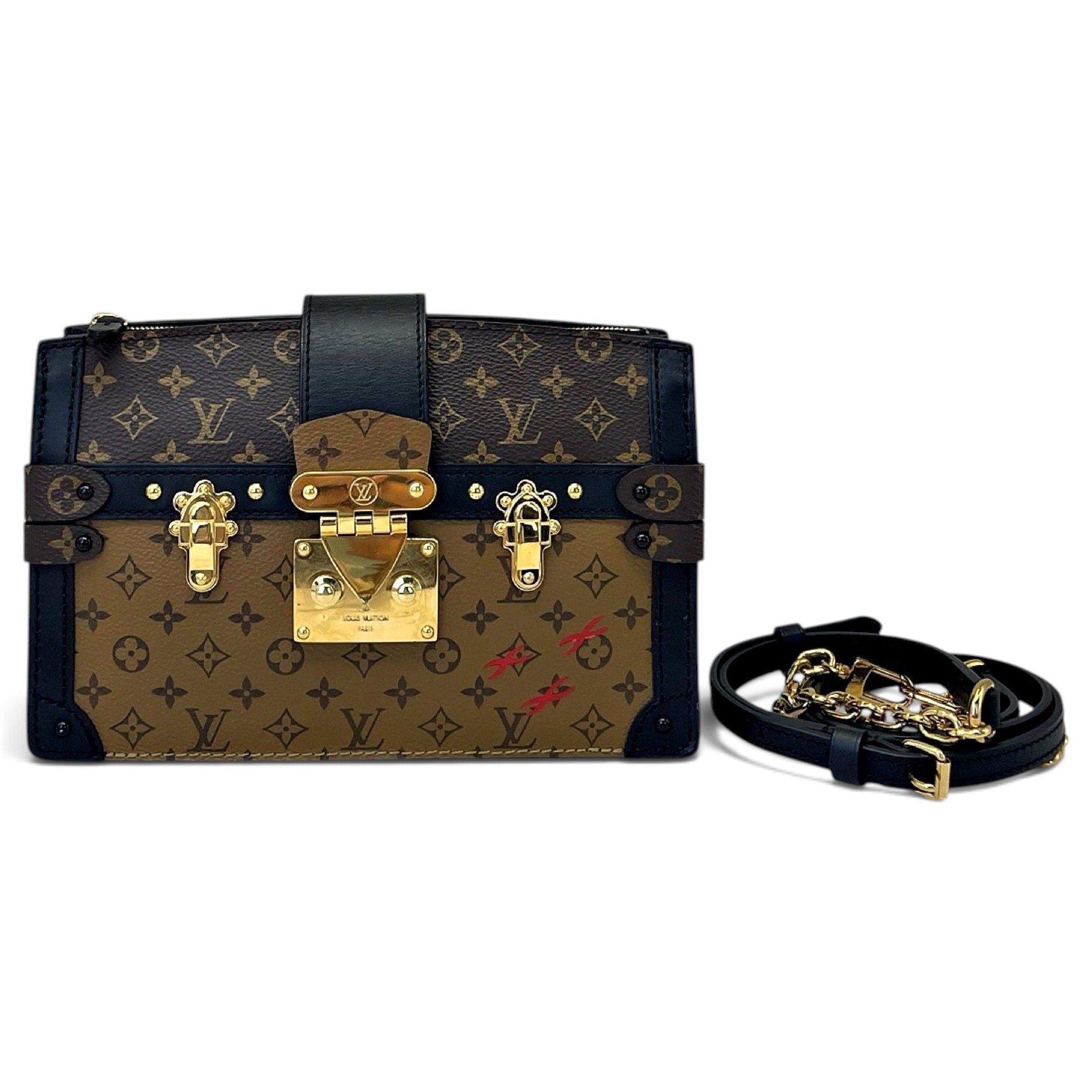 Pochette Trunk leather handbag