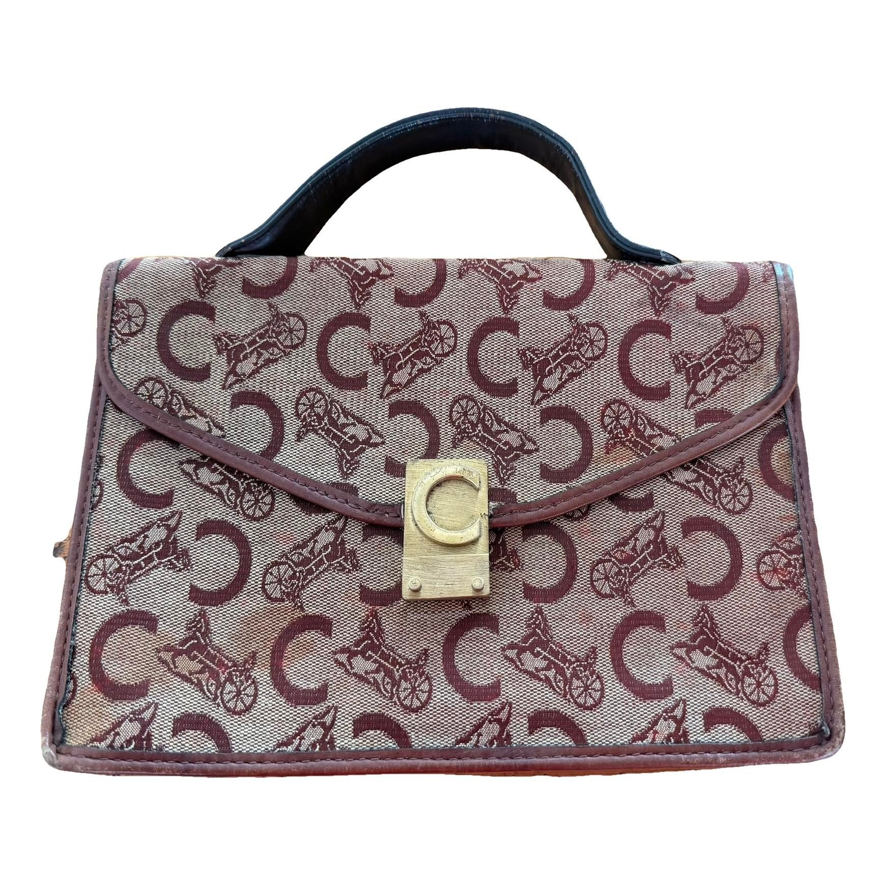 Triomphe Vintage cloth clutch bag