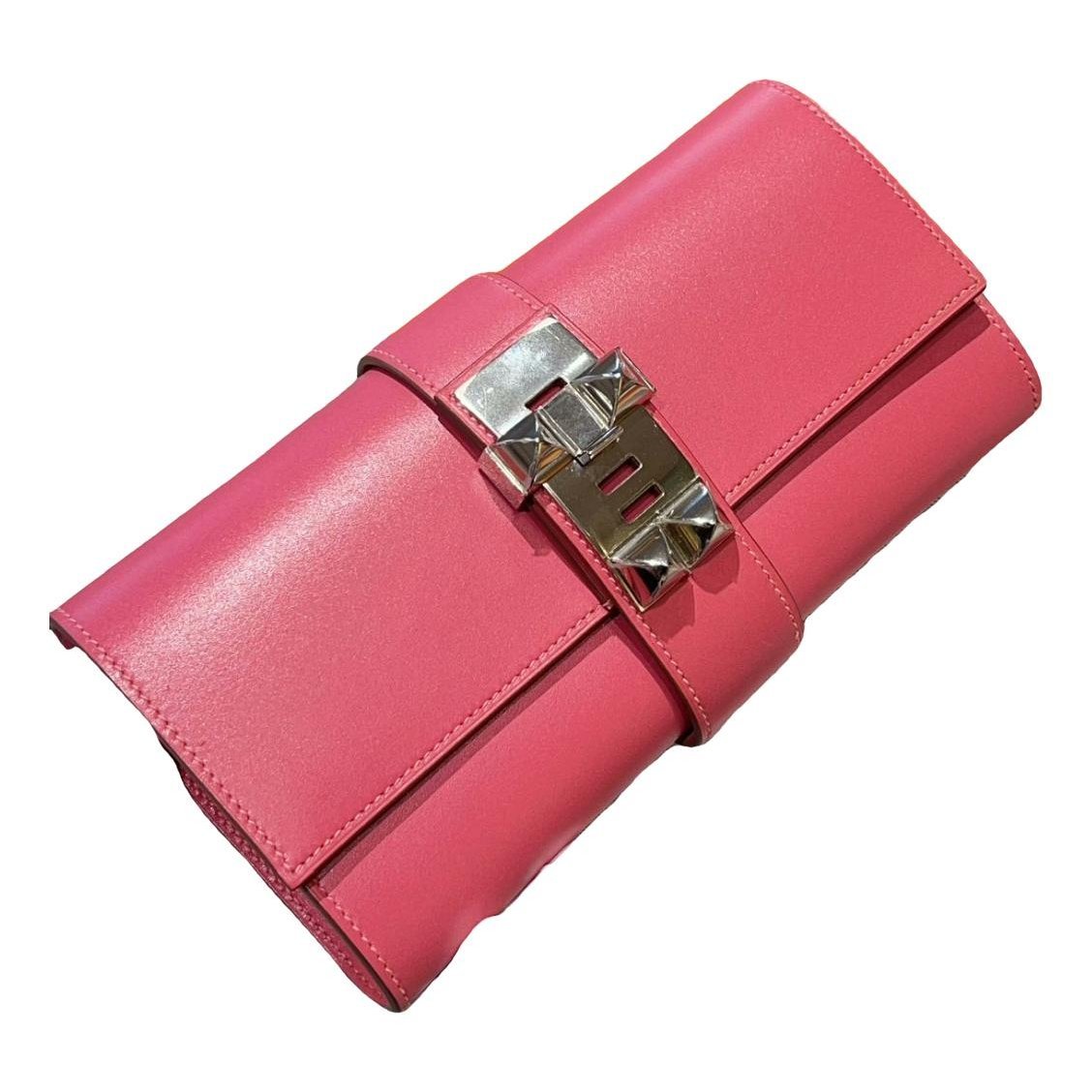 Médor leather clutch bag